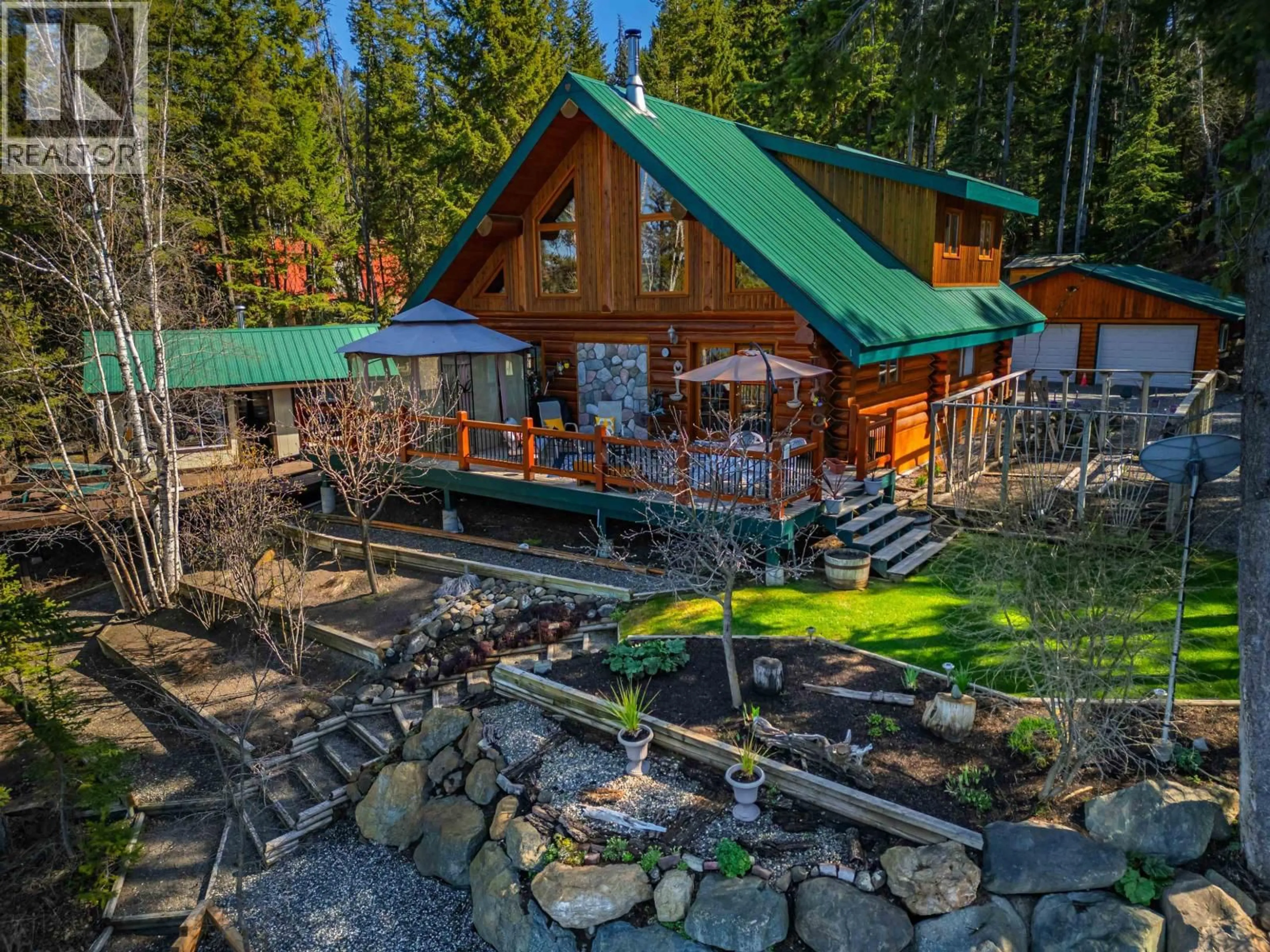 A pic from outside/outdoor area/front of a property/back of a property/a pic from drone, forest/trees view for 4677 CAVERLY ROAD, Lac La Hache British Columbia V0K1T0