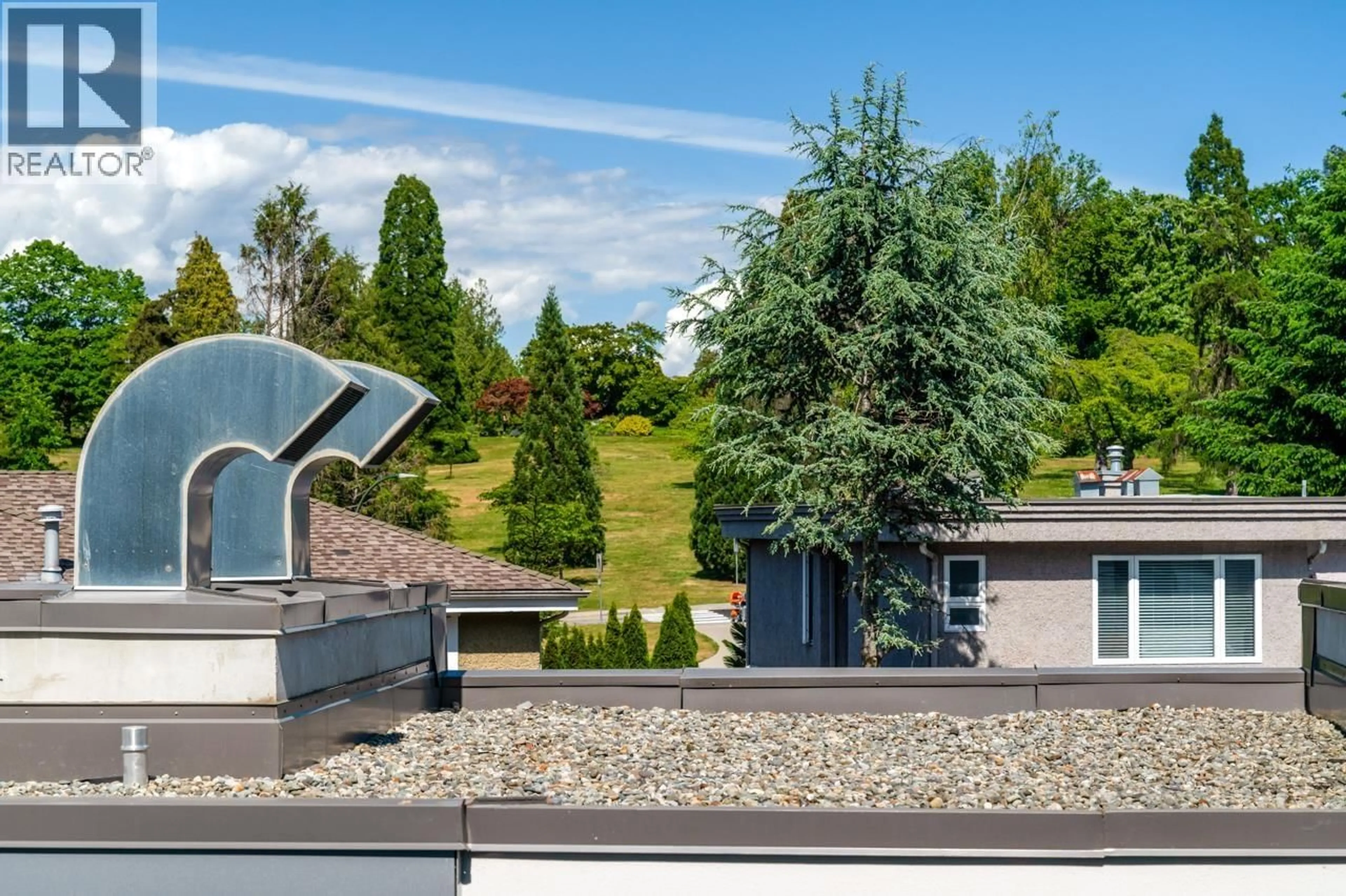 A pic from outside/outdoor area/front of a property/back of a property/a pic from drone, mountain view for 302 - 4932 CAMBIE STREET, Vancouver British Columbia V5Z0K1