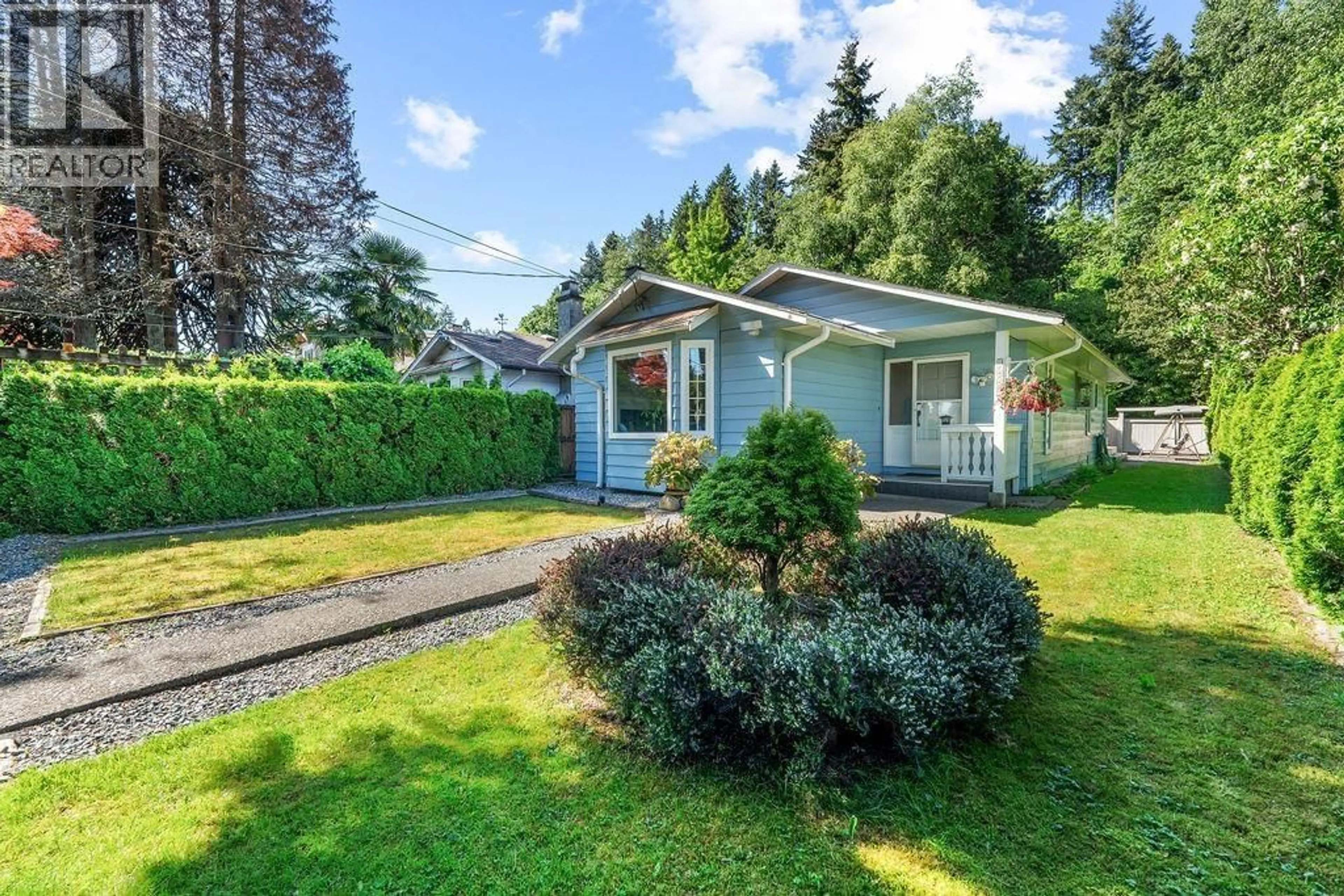 Home with vinyl exterior material, street for 1440 HOPE ROAD, North Vancouver British Columbia V7P1W8