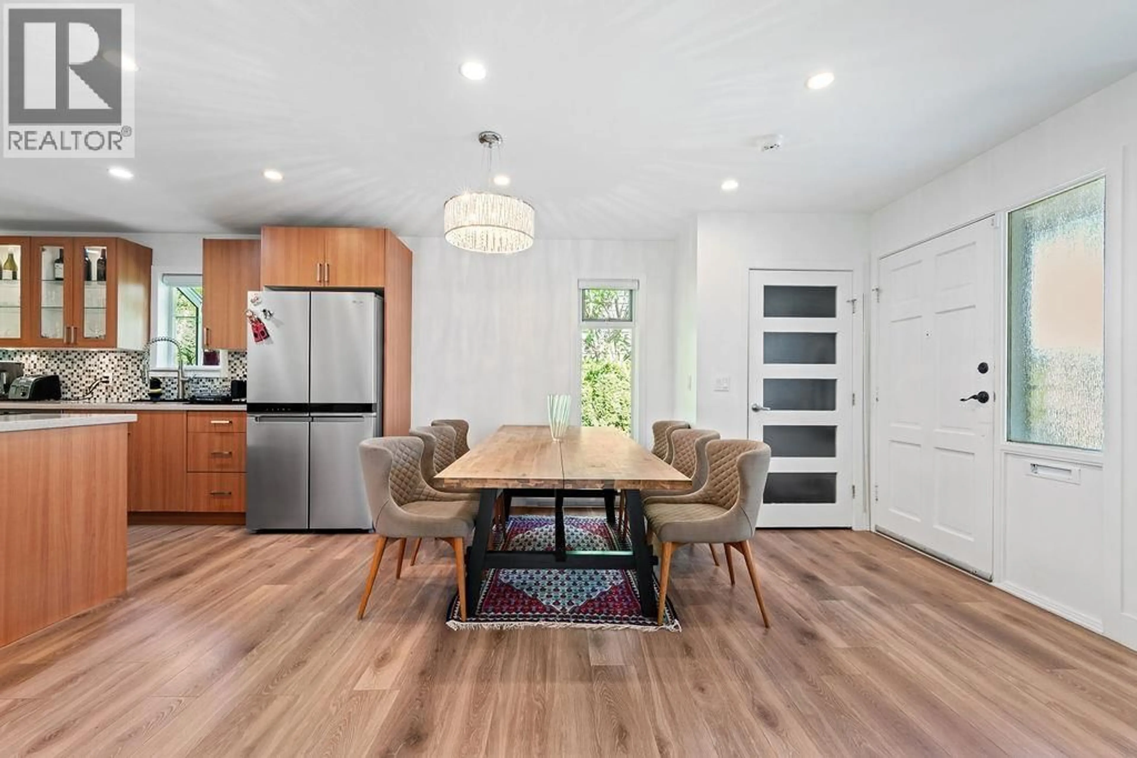 Open concept kitchen, wood/laminate floor for 1440 HOPE ROAD, North Vancouver British Columbia V7P1W8