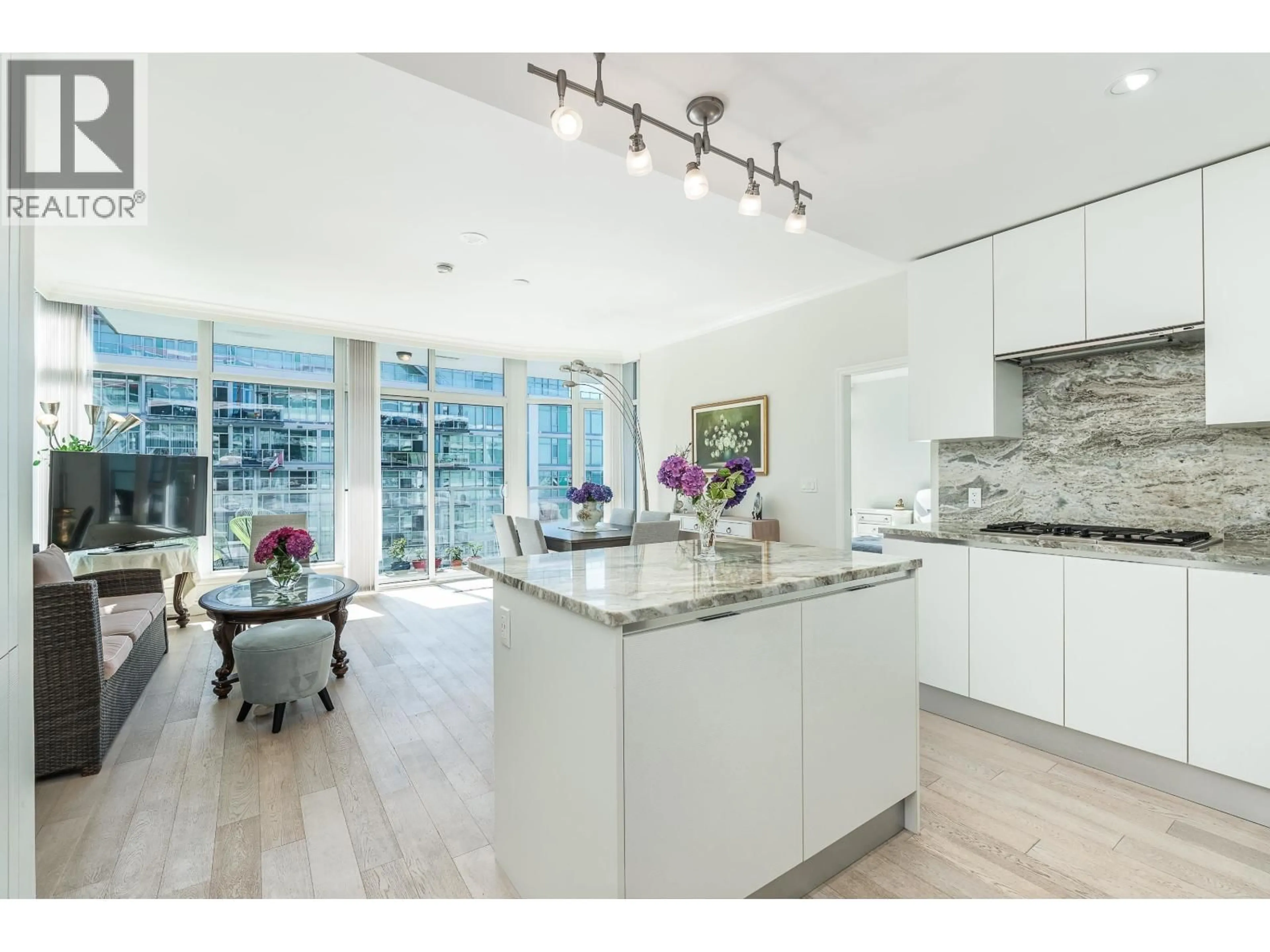 Open concept kitchen, unknown for 703 - 175 VICTORY SHIP WAY, North Vancouver British Columbia V7L0G1