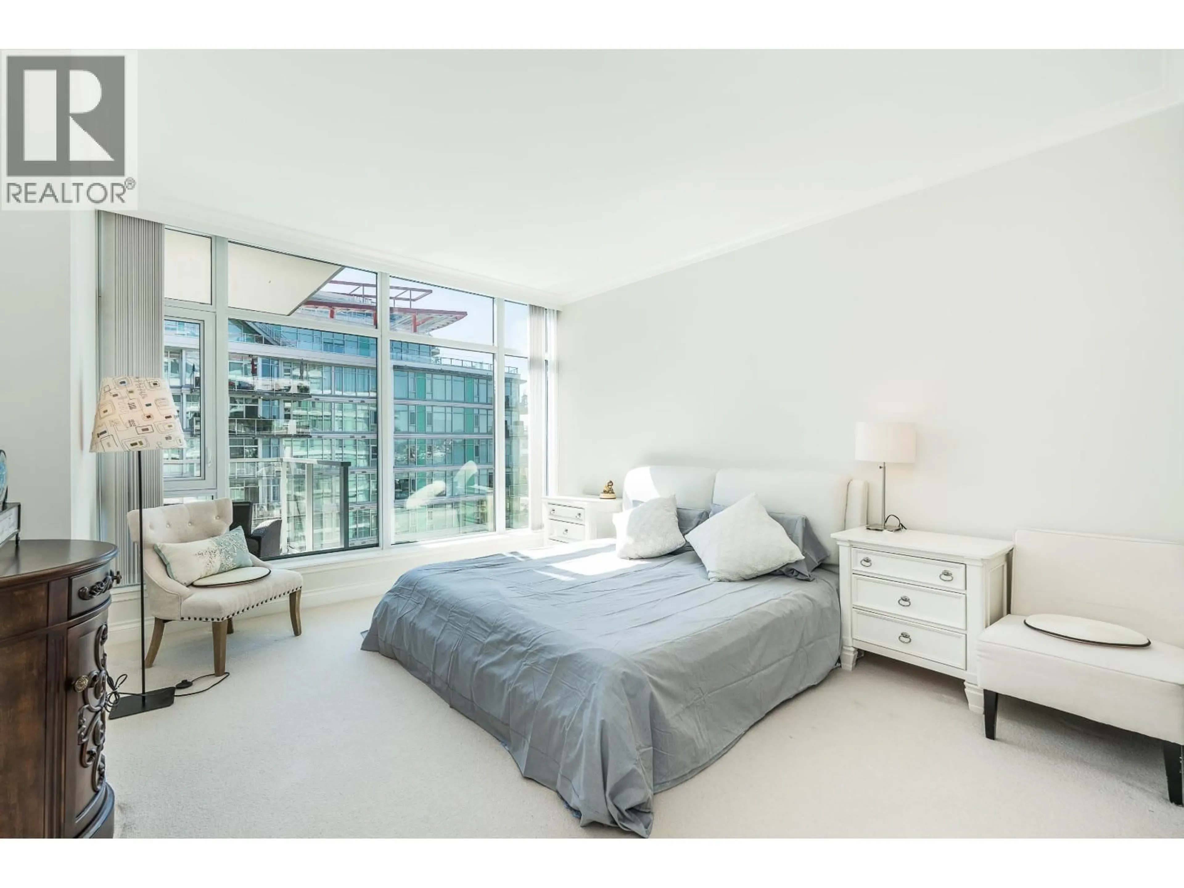 Bedroom with bed, unknown for 703 - 175 VICTORY SHIP WAY, North Vancouver British Columbia V7L0G1