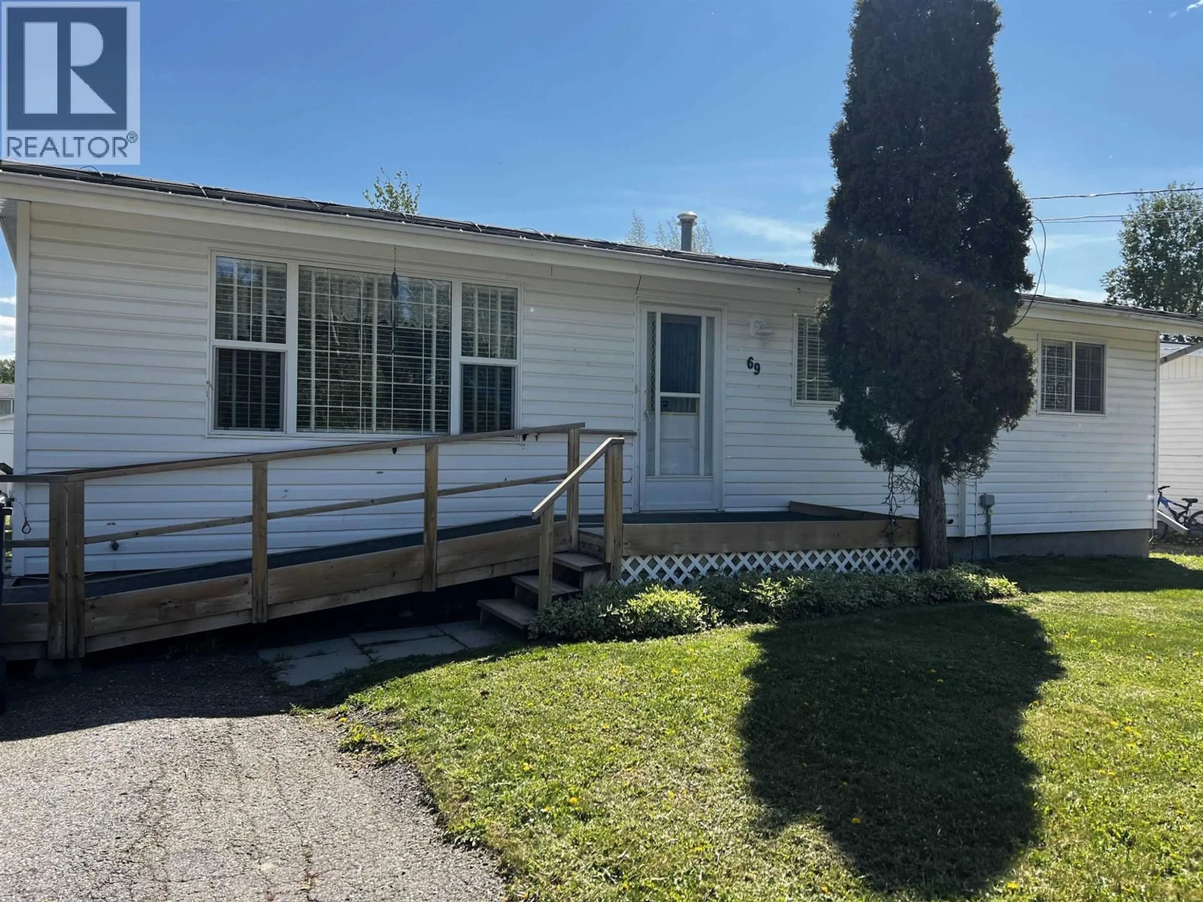 Home with vinyl exterior material, street for 69 FRANCOIS DRIVE, Fraser Lake British Columbia V0J1S0