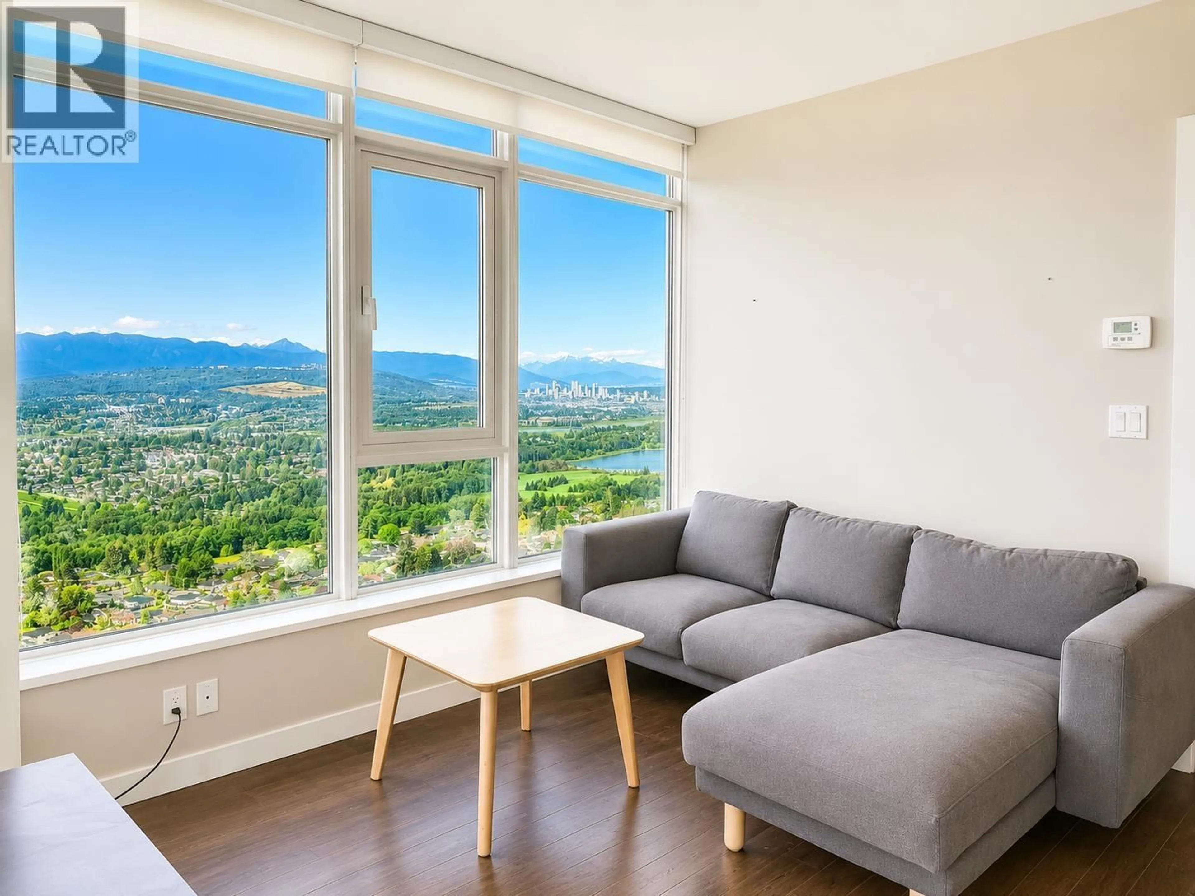 Living room with furniture, wood/laminate floor for 3707 - 4508 HAZEL STREET, Burnaby British Columbia V5H0E4
