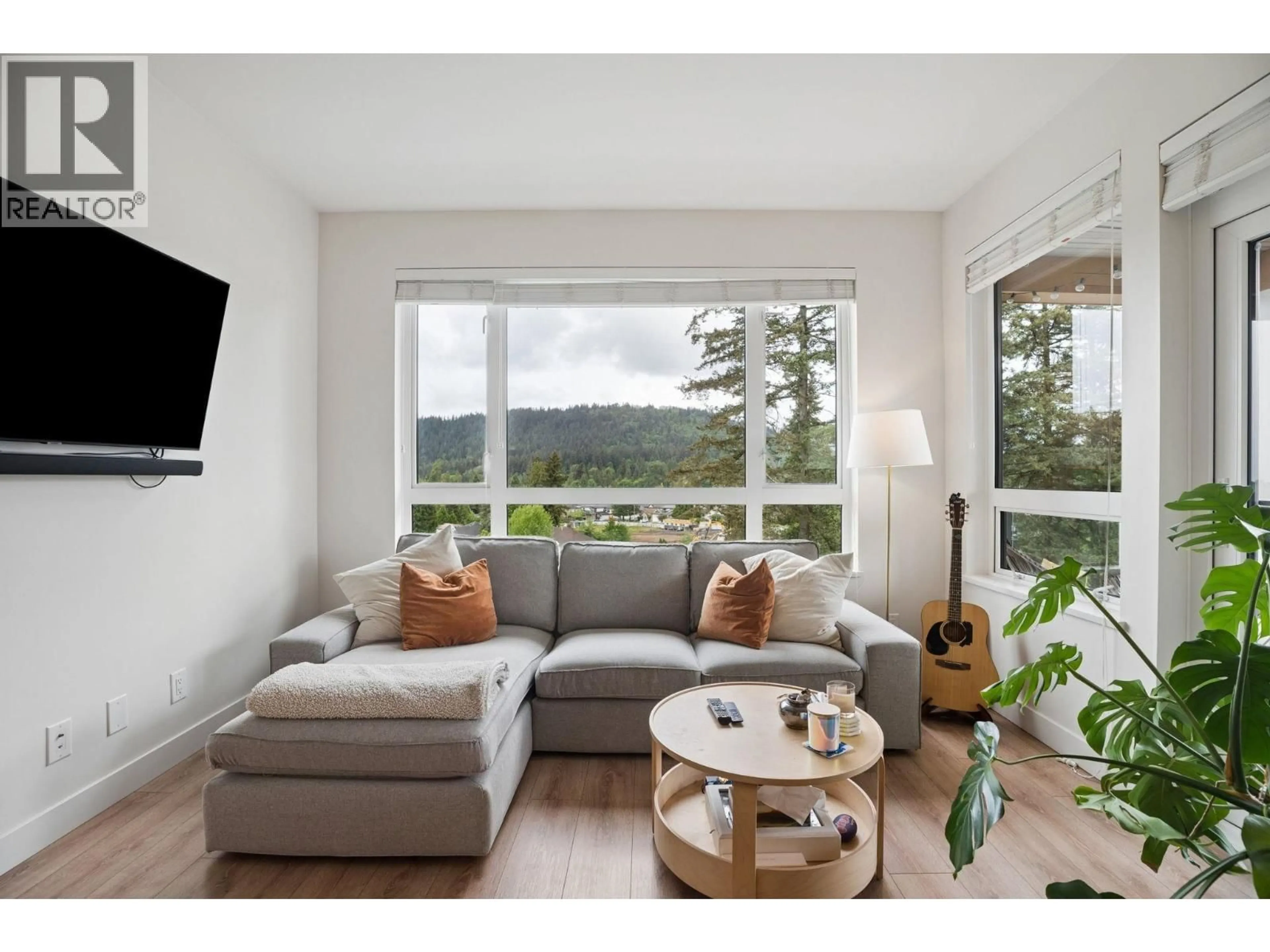 Living room with furniture, wood/laminate floor for 612 - 721 ANSKAR COURT, Coquitlam British Columbia V3J0L4