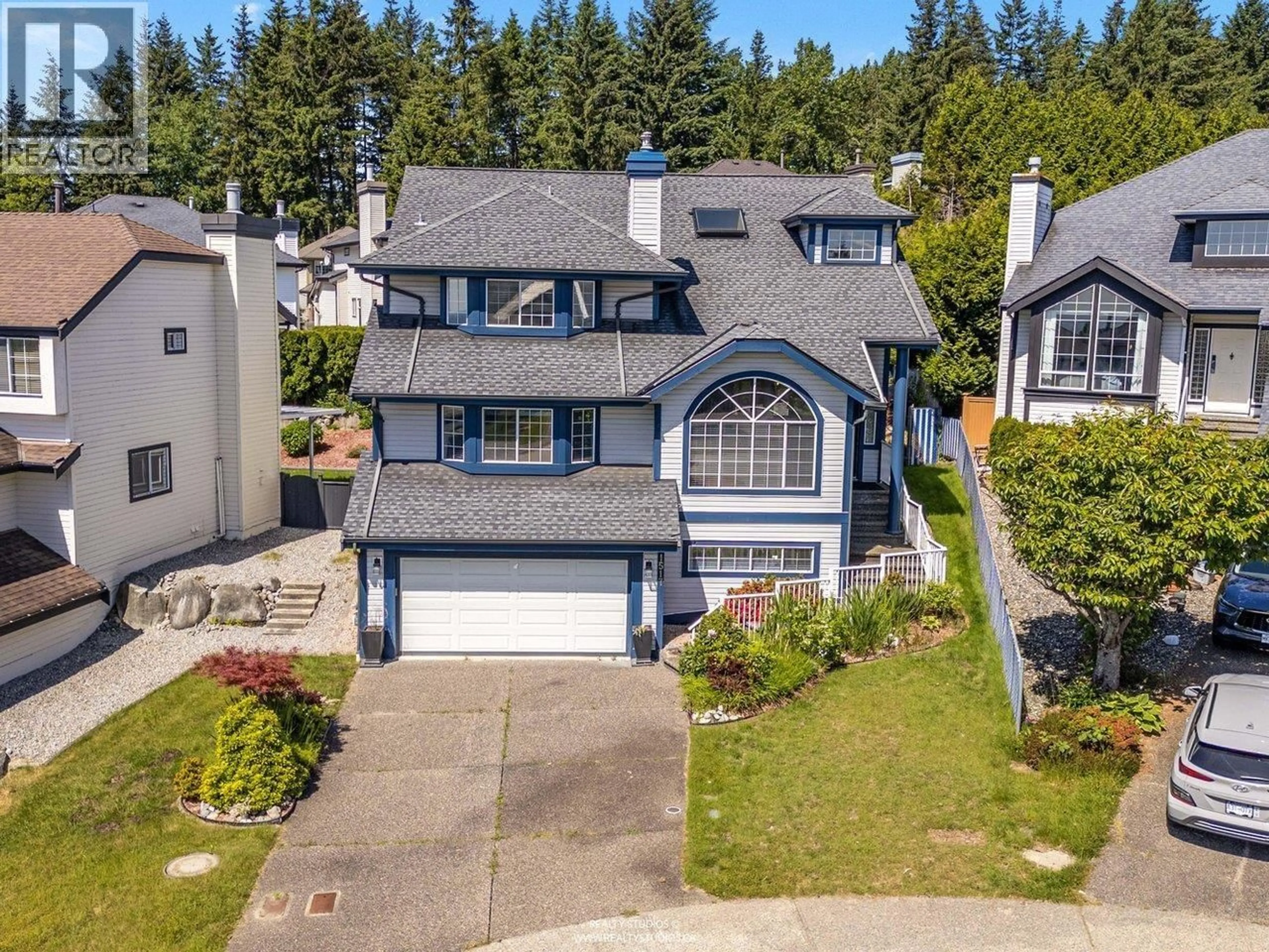 A pic from outside/outdoor area/front of a property/back of a property/a pic from drone, street for 1517 STARFLOWER PLACE, Coquitlam British Columbia V3E2V2