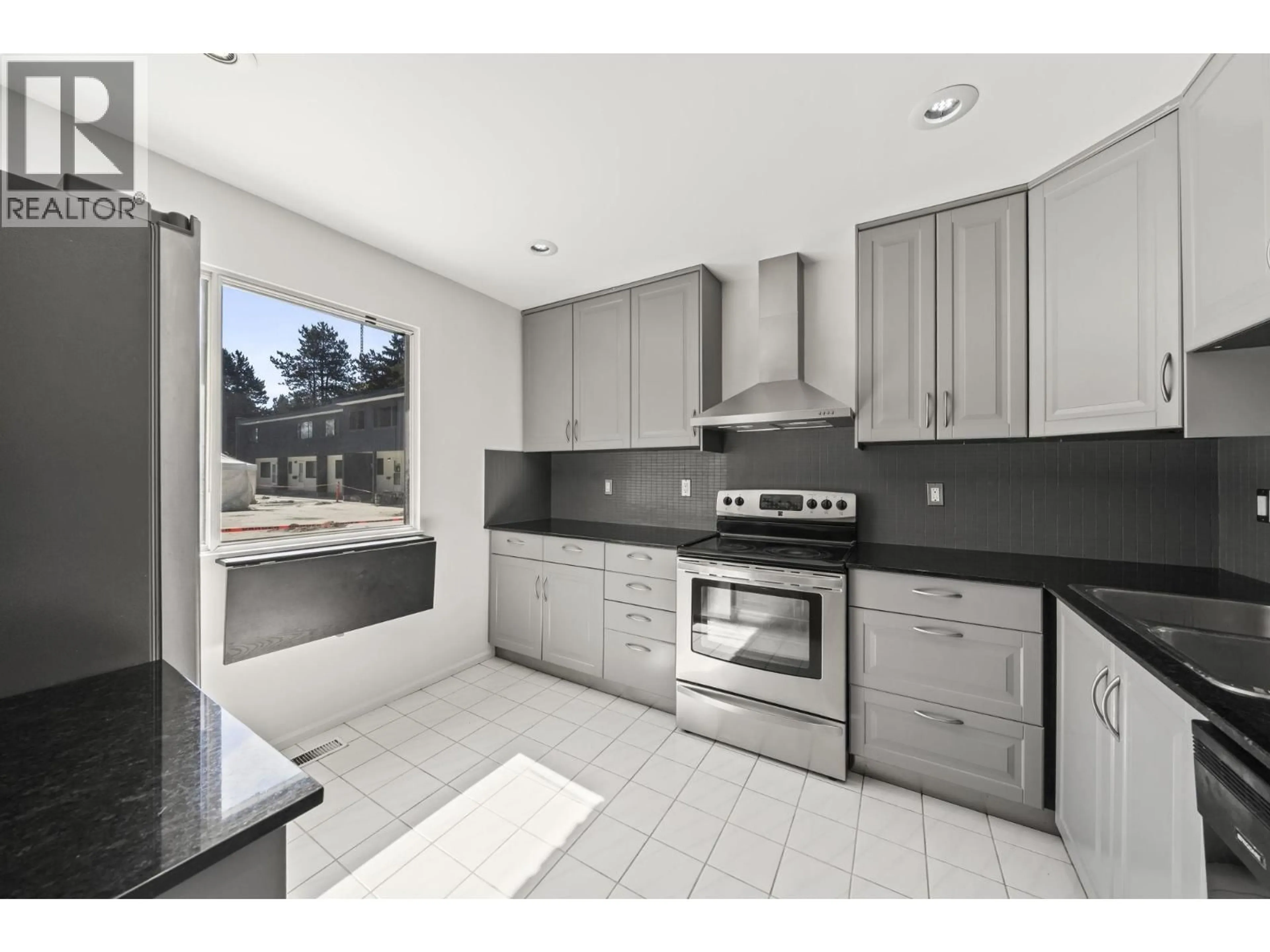 Open concept kitchen, unknown for 7326 CAPISTRANO DRIVE, Burnaby British Columbia V5A1P8