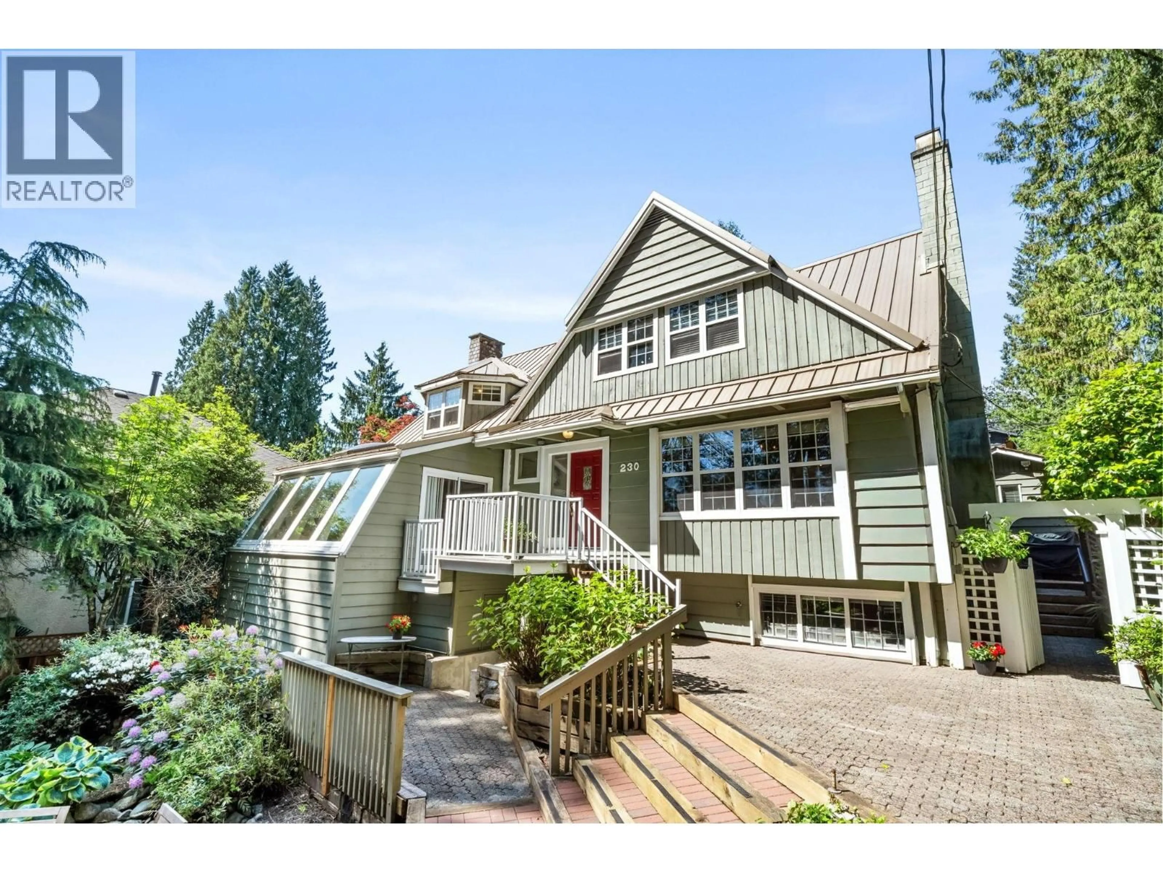 Home with vinyl exterior material, street for 230 22ND STREET, North Vancouver British Columbia V7M2A1