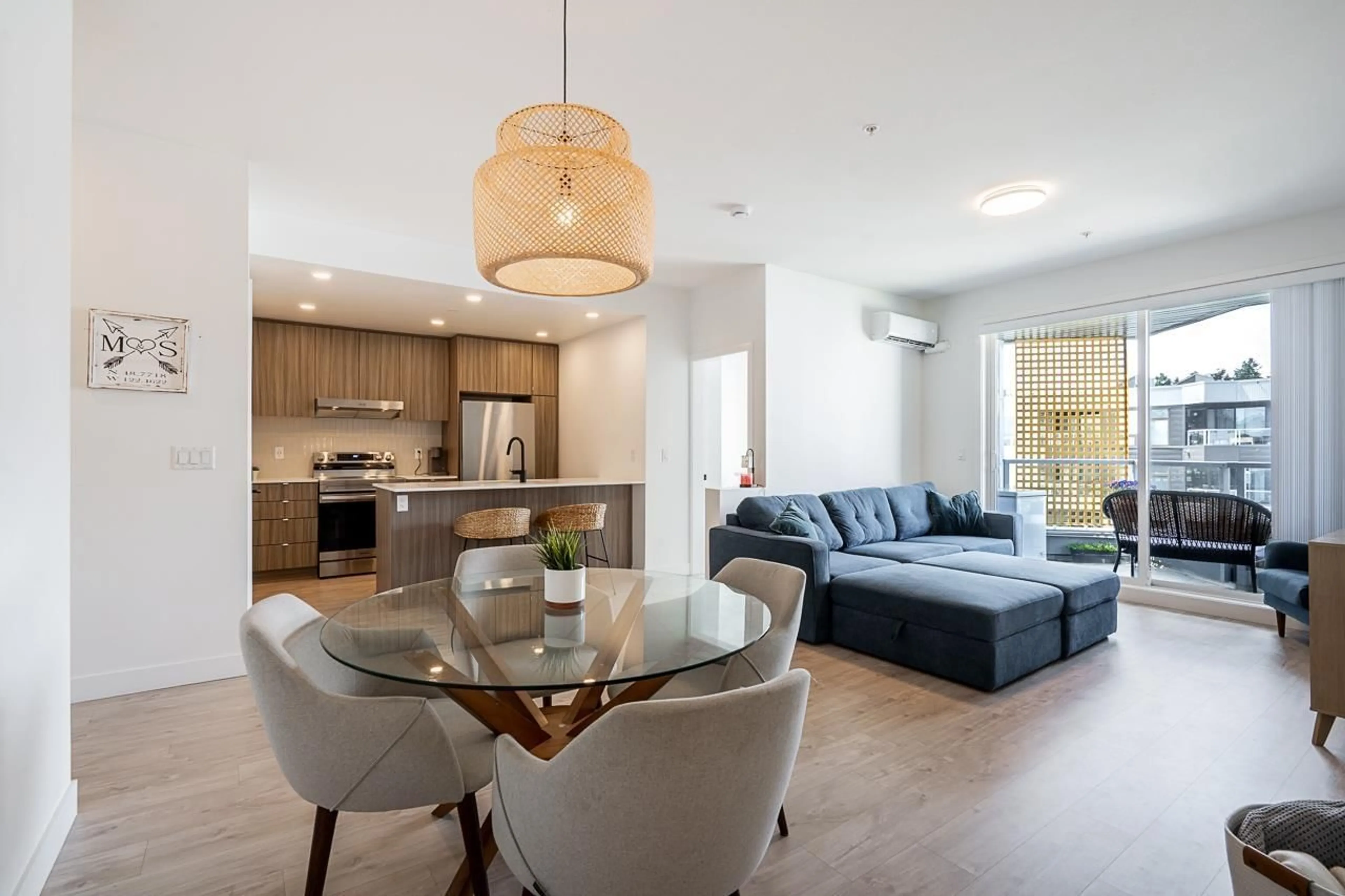Open concept kitchen, wood/laminate floor for 609 - 32838 LANDEAU PLACE, Abbotsford British Columbia V2S0M6