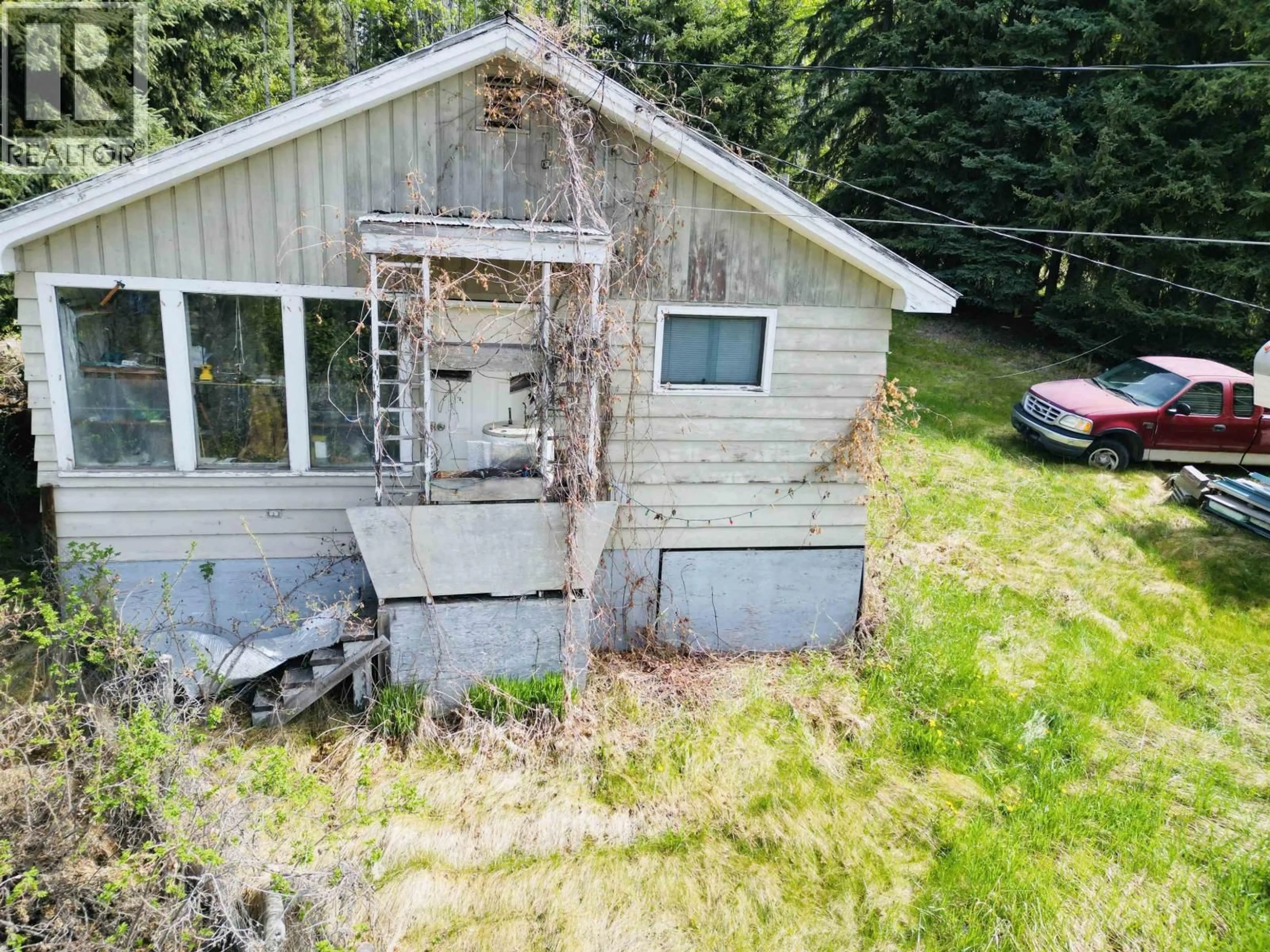 A pic from outside/outdoor area/front of a property/back of a property/a pic from drone, building for 10246 16 HIGHWAY, Burns Lake British Columbia V0J1E1