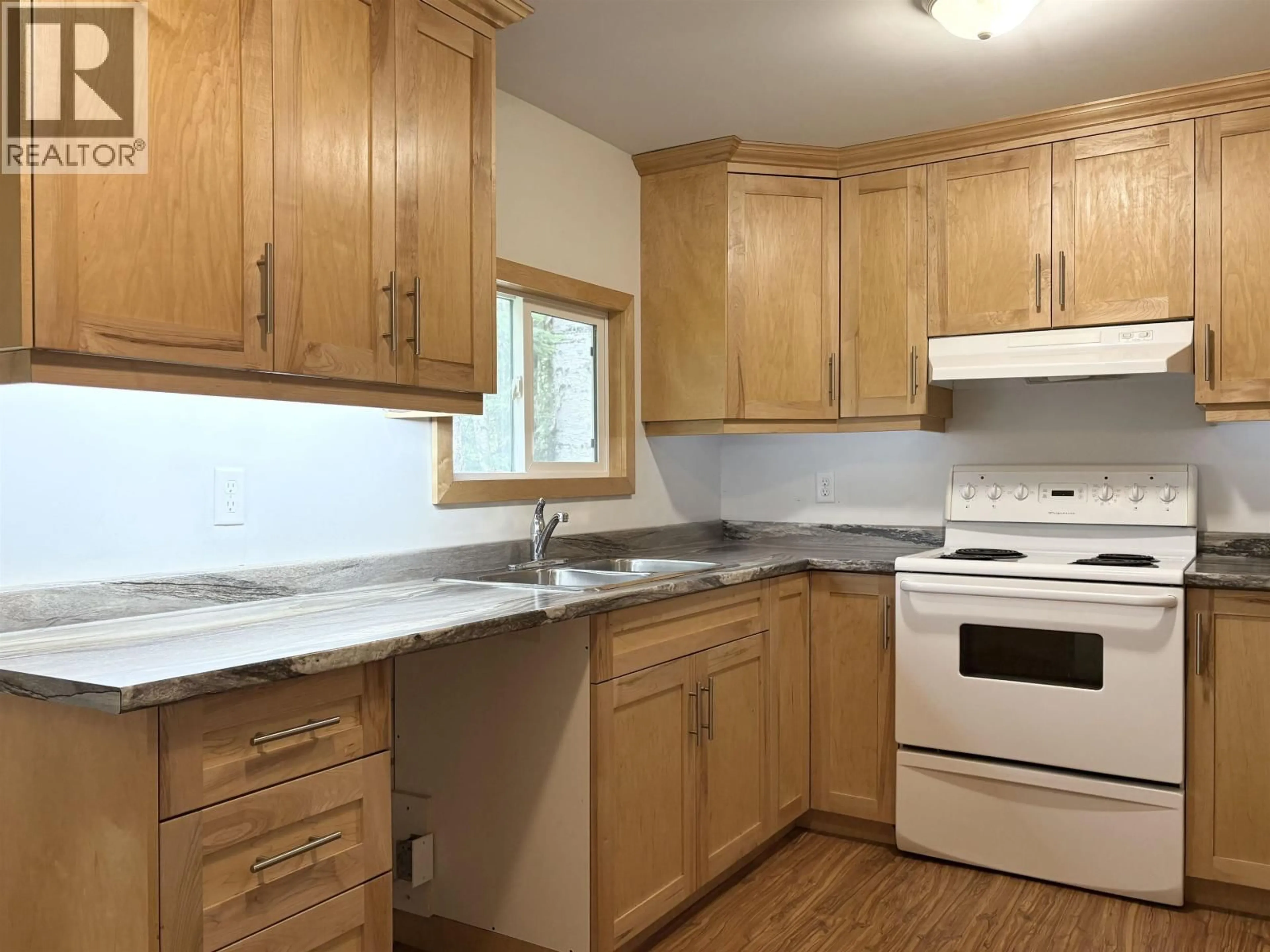 Standard kitchen, wood/laminate floor for 8366 DOMAGALA ROAD, Prince George British Columbia V2K5R1