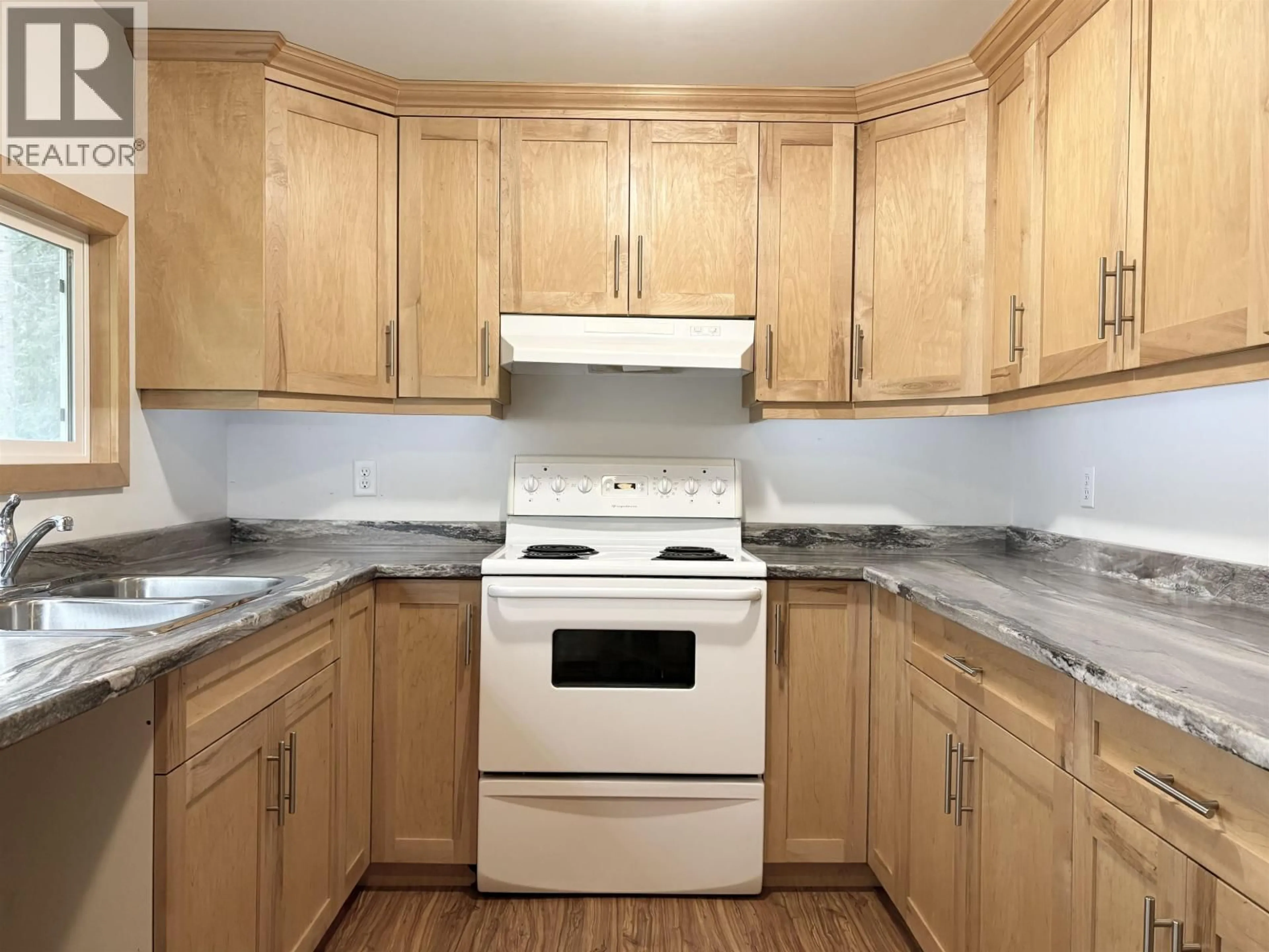 Standard kitchen, wood/laminate floor for 8366 DOMAGALA ROAD, Prince George British Columbia V2K5R1