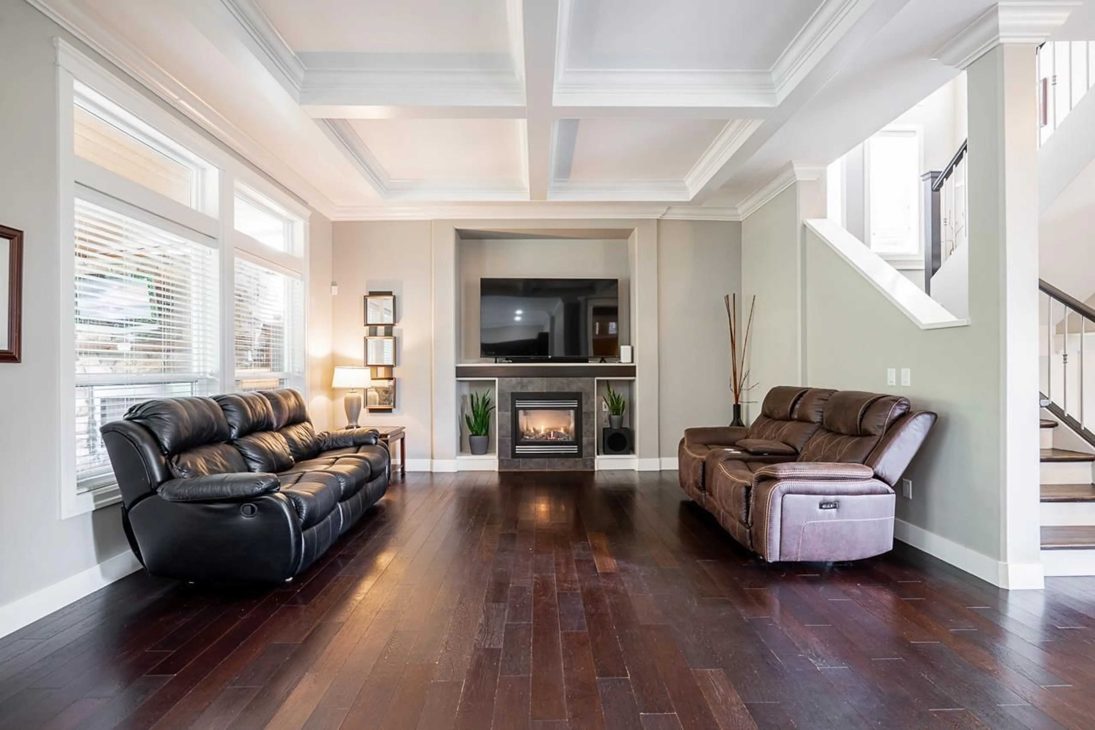 Living room with furniture, wood/laminate floor for 6074 163B STREET, Surrey British Columbia V3S2H7