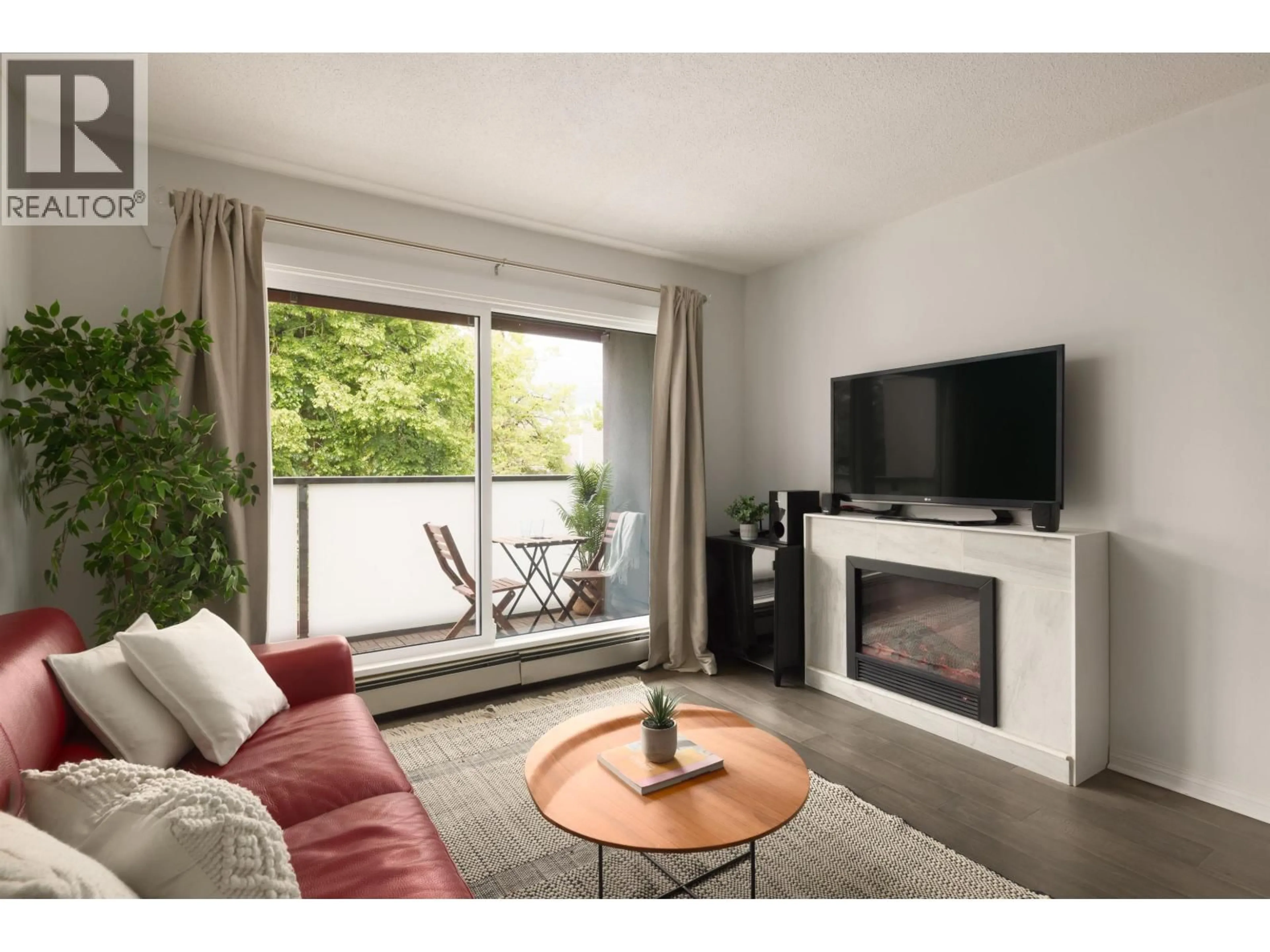 Living room with furniture, wood/laminate floor for 306 - 570 8TH AVENUE, Vancouver British Columbia V5T1S8