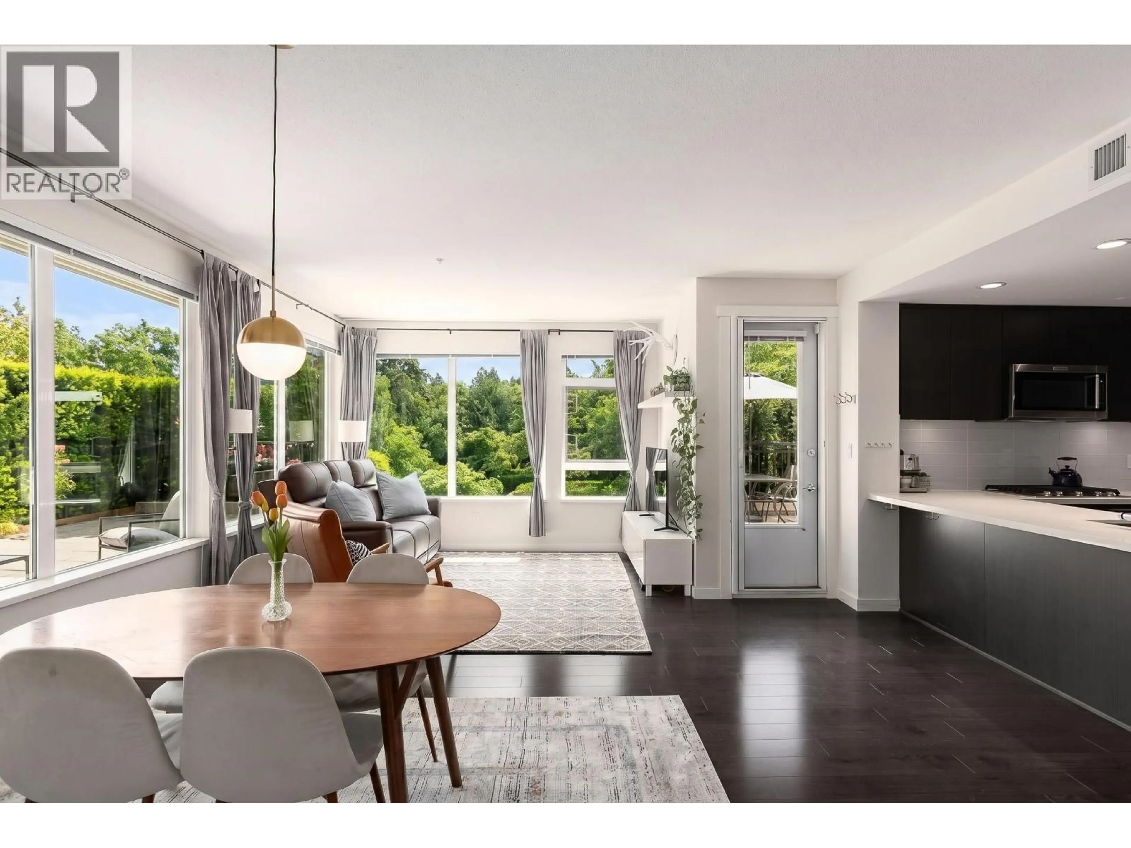 Open concept kitchen, wood/laminate floor for 120 - 255 1ST STREET, North Vancouver British Columbia V7M3G8