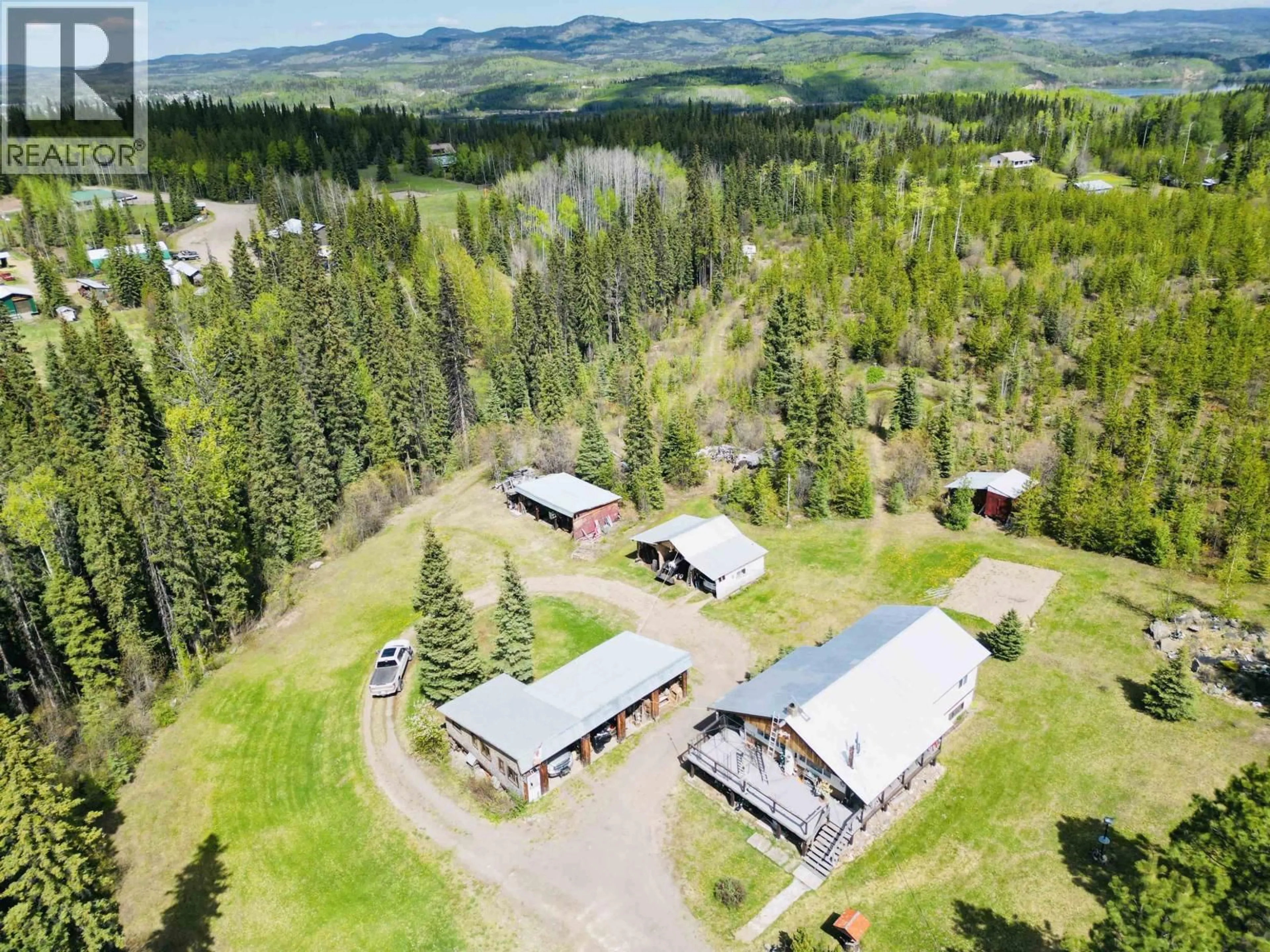 A pic from outside/outdoor area/front of a property/back of a property/a pic from drone, mountain view for 2040 BEACH ROAD, Burns Lake British Columbia V0J1E2