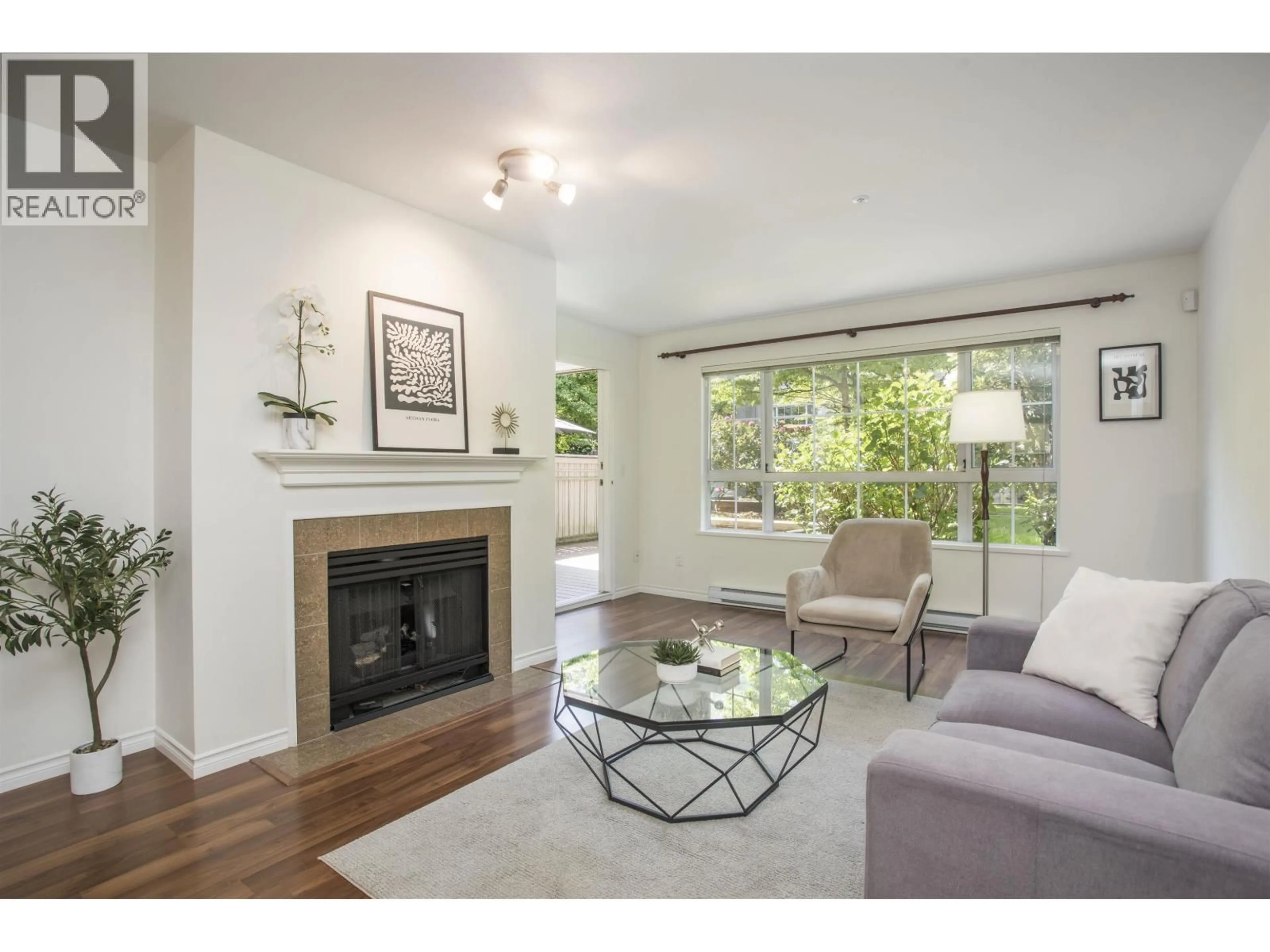 Living room with furniture, wood/laminate floor for 144 - 2980 PRINCESS CRESCENT, Coquitlam British Columbia V3B7R4
