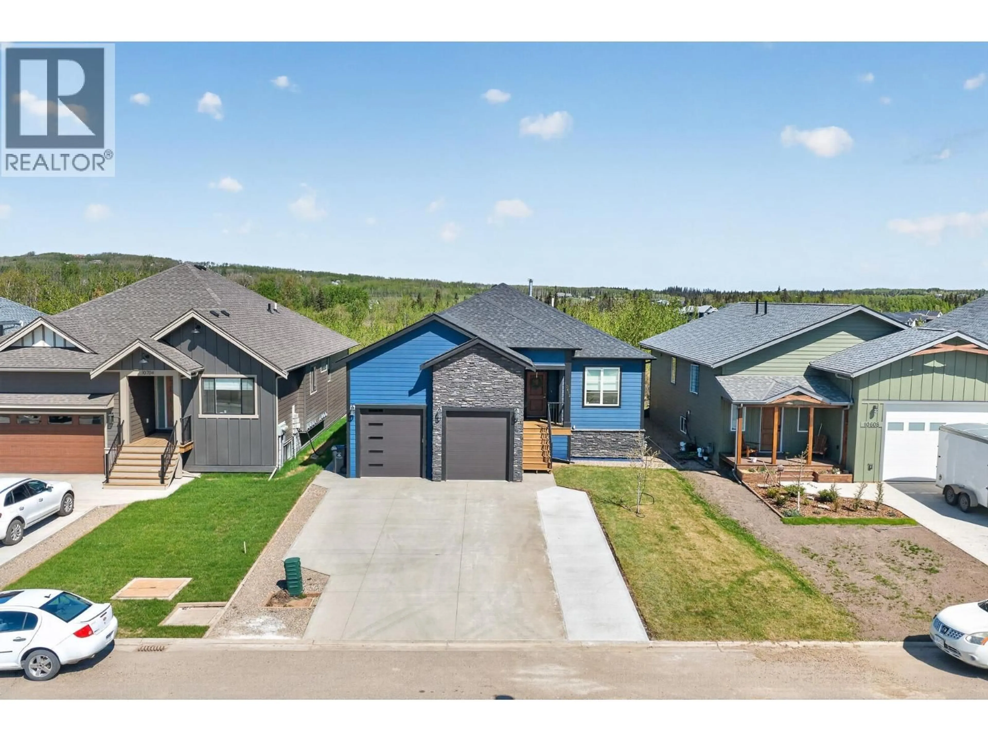 A pic from outside/outdoor area/front of a property/back of a property/a pic from drone, water/lake/river/ocean view for 10612 114A AVENUE, Fort St. John British Columbia V1J0S1