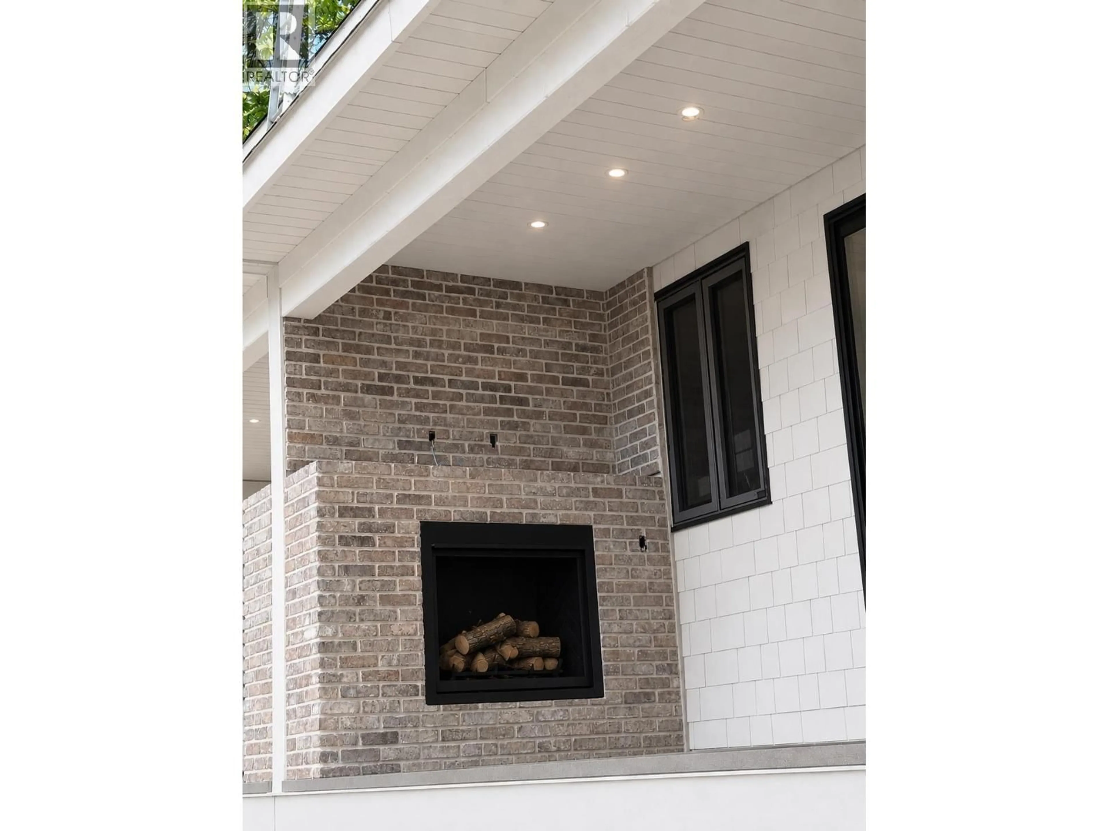 Home with brick exterior material, street for 1 - 1065 RIDLEY DRIVE, Burnaby British Columbia V5A2N7