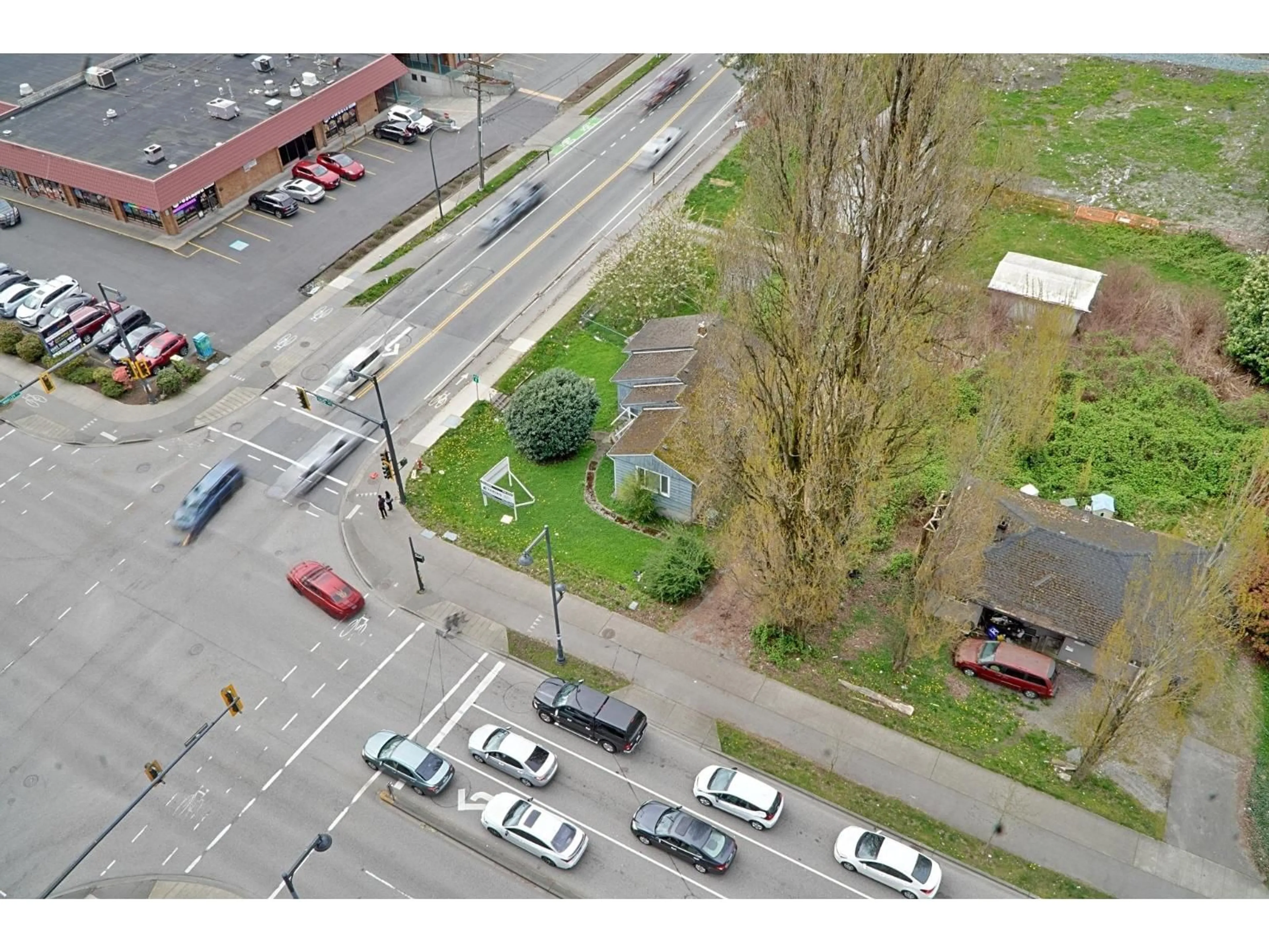 A pic from outside/outdoor area/front of a property/back of a property/a pic from drone, street for 13691 100 AVENUE, Surrey British Columbia V3T1J1
