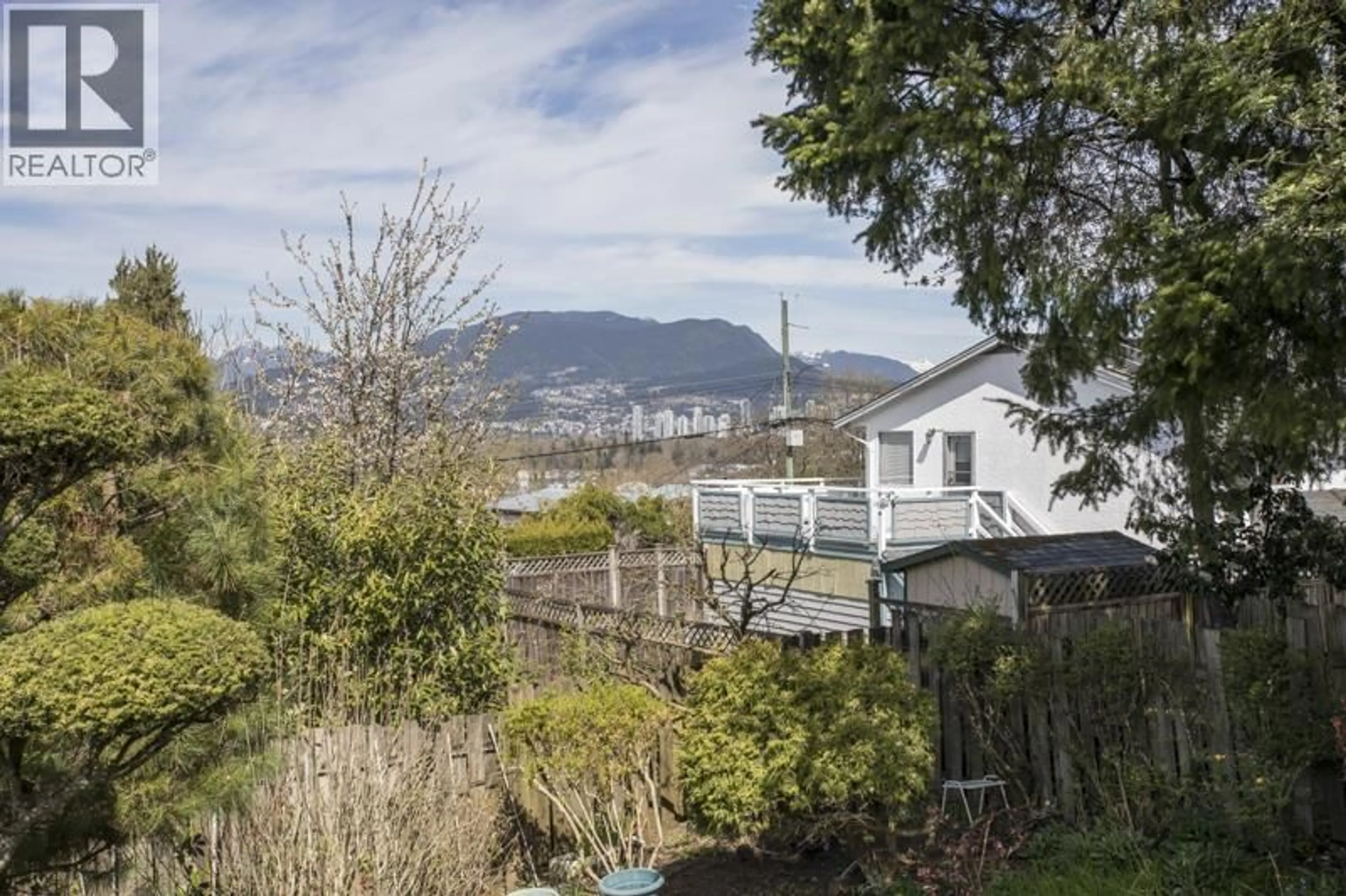 A pic from outside/outdoor area/front of a property/back of a property/a pic from drone, mountain view for 1470 JUNE CRESCENT, Port Coquitlam British Columbia V3C2Y1