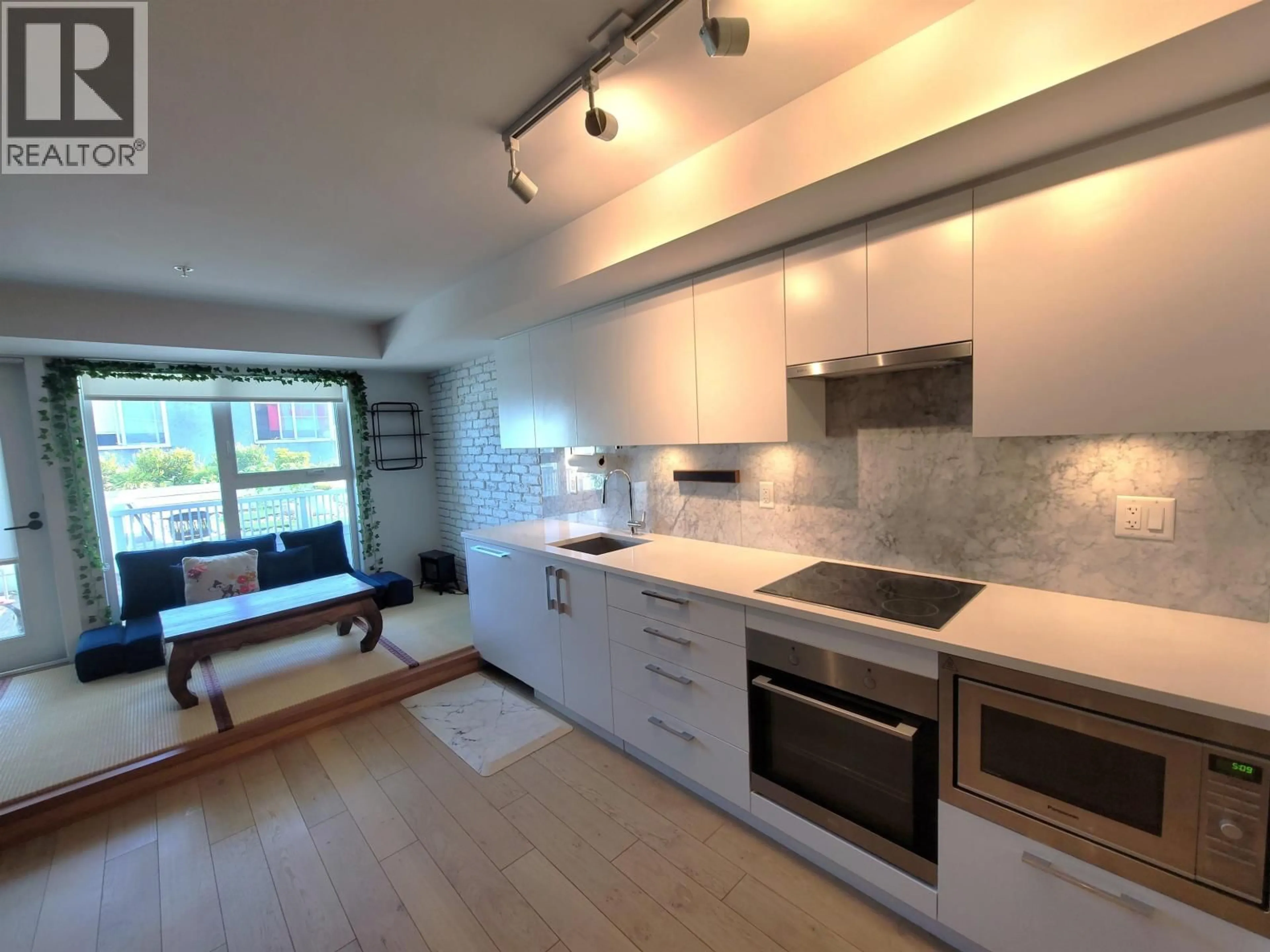 Standard kitchen, unknown for 211 - 2508 FRASER STREET, Vancouver British Columbia V5T1T1