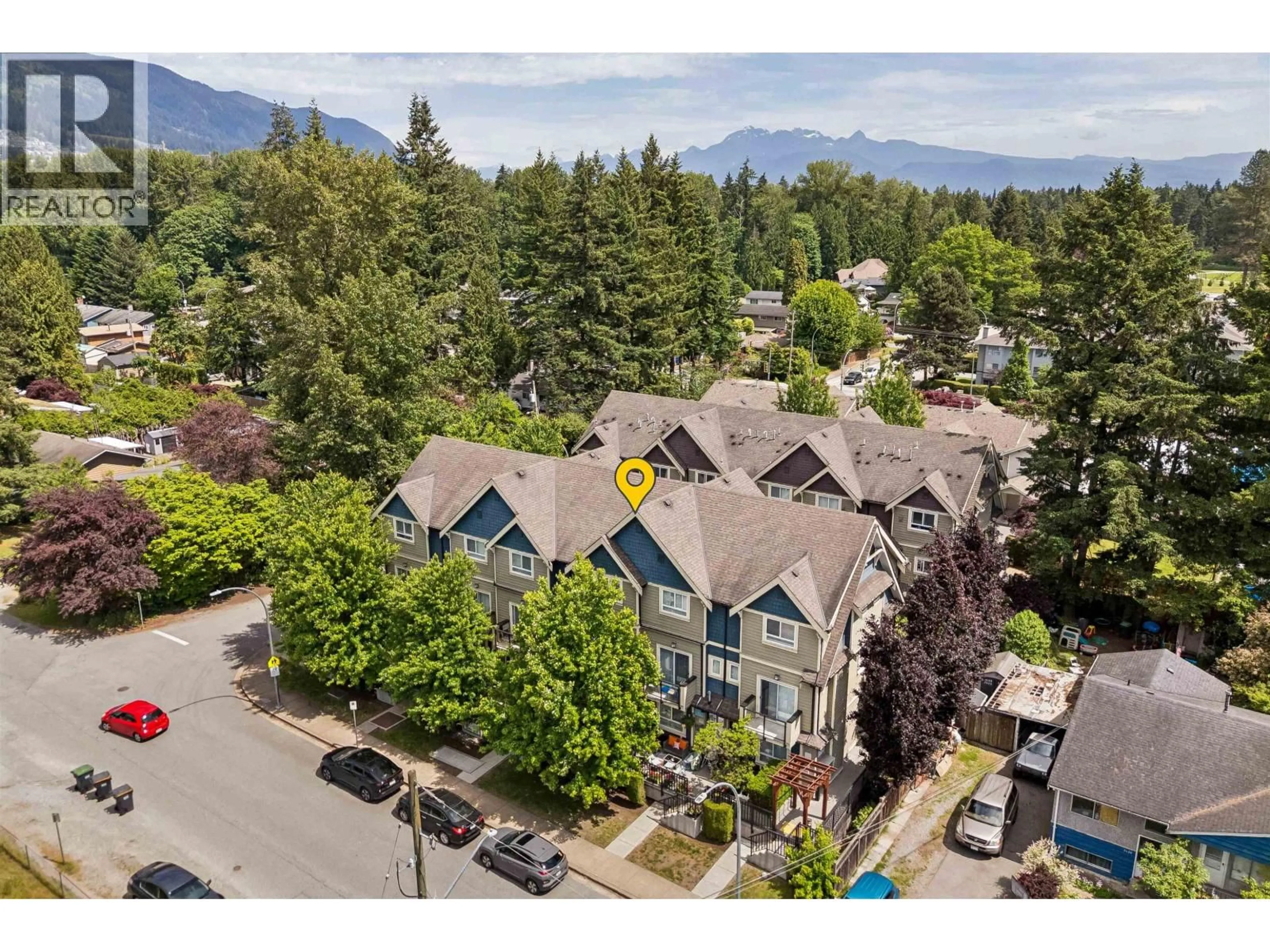 A pic from outside/outdoor area/front of a property/back of a property/a pic from drone, mountain view for 203 - 3488 SEFTON STREET, Port Coquitlam British Columbia V3B3R2