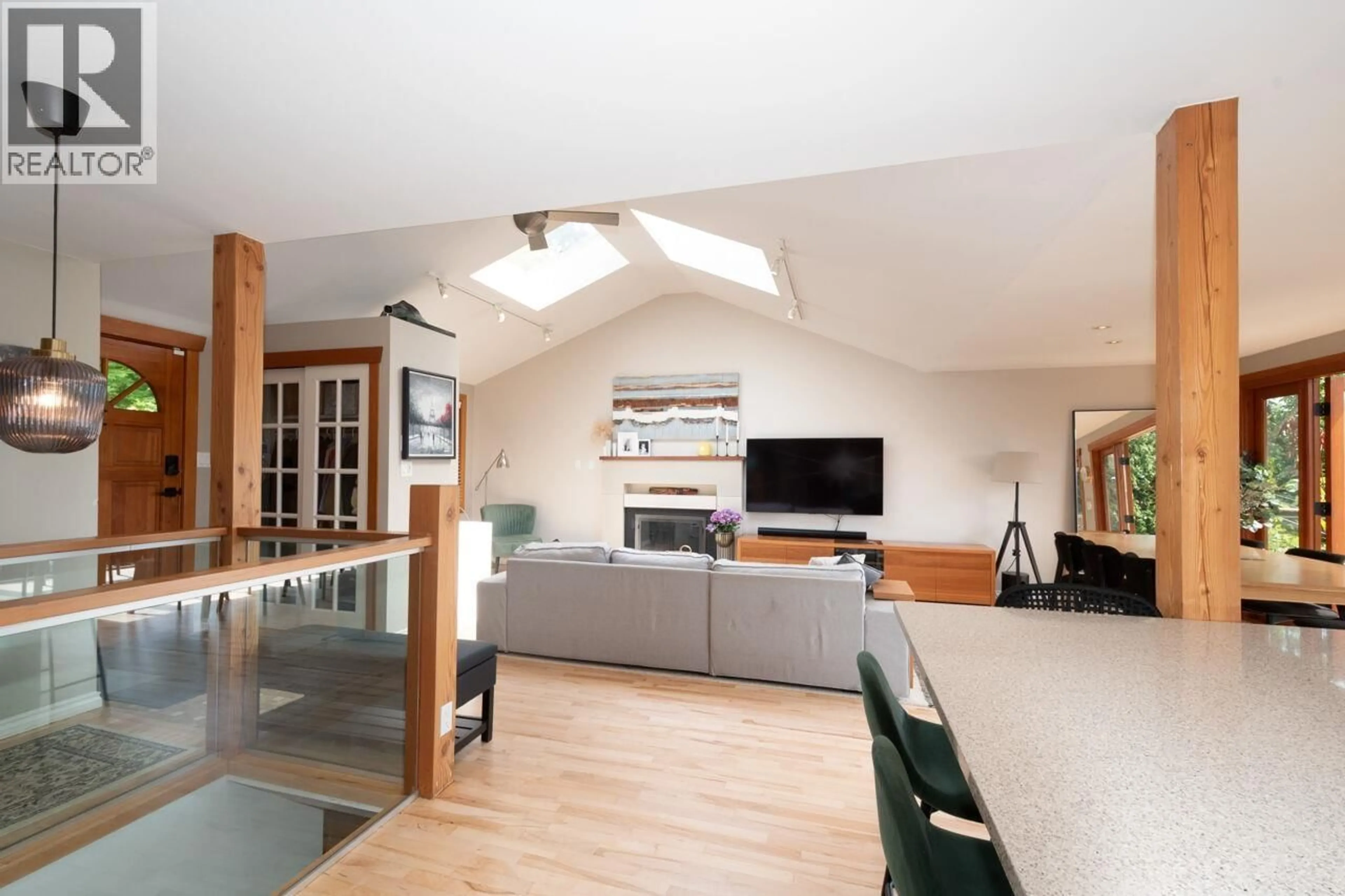 Living room with furniture, wood/laminate floor for 1185 CLOVERLEY STREET, North Vancouver British Columbia V7L1N7