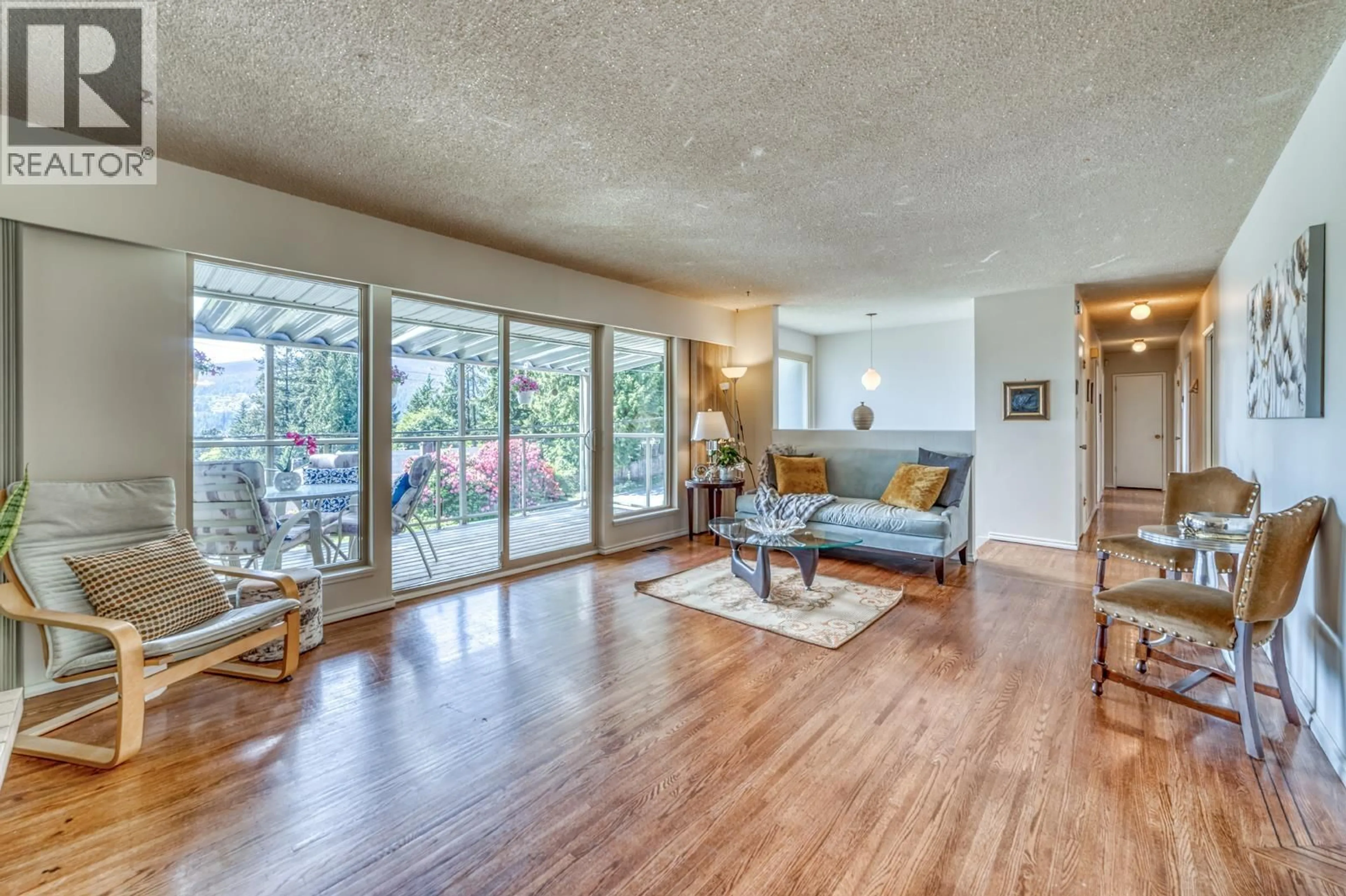 Living room with furniture, wood/laminate floor for 4902 RANGER AVENUE, North Vancouver British Columbia V7R3M4