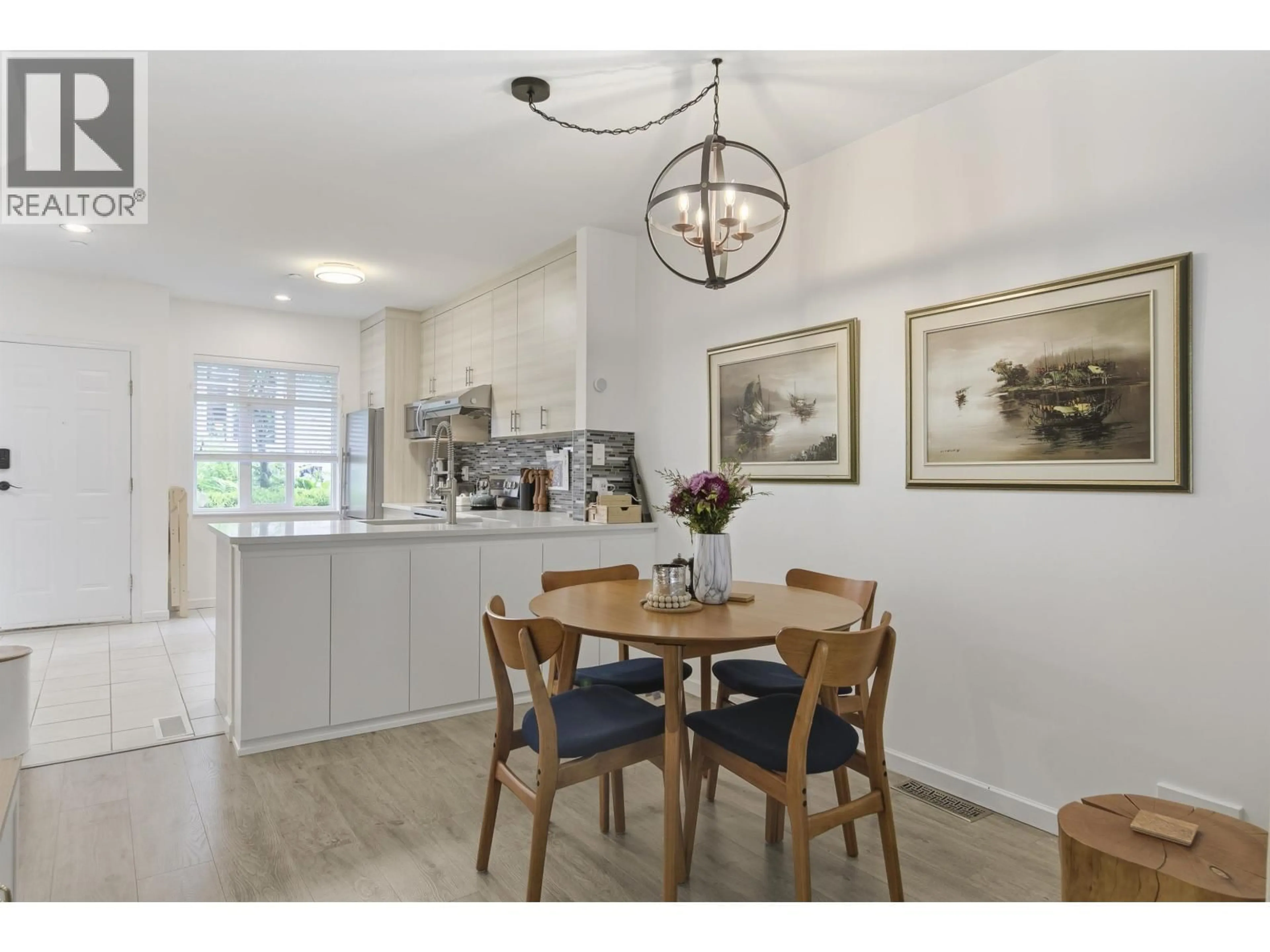 Dining room, wood/laminate floor for 8529 JELLICOE STREET, Vancouver British Columbia V5S4T5