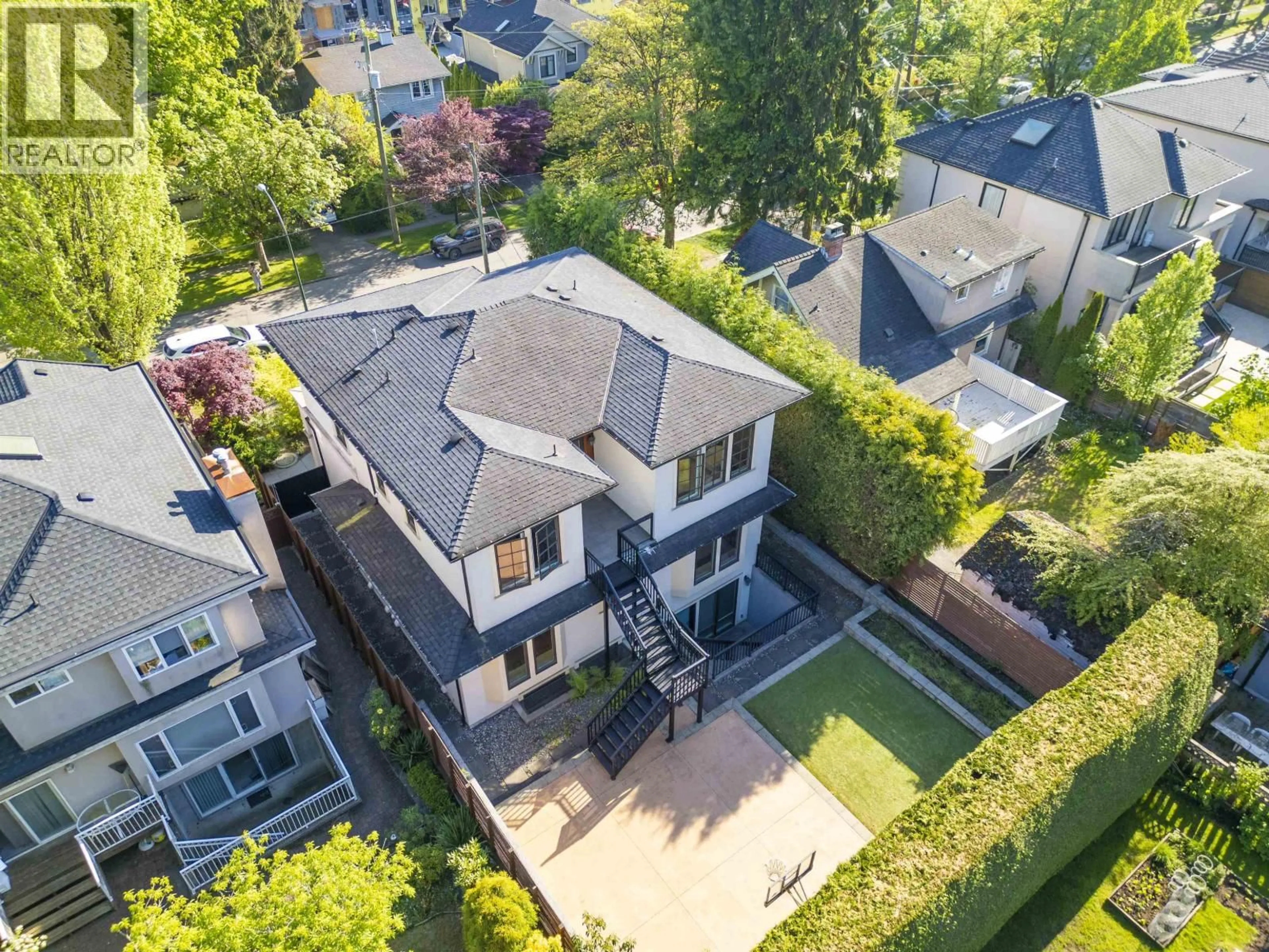 A pic from outside/outdoor area/front of a property/back of a property/a pic from drone, street for 3439 40TH W AVENUE, Vancouver British Columbia V6N3B5