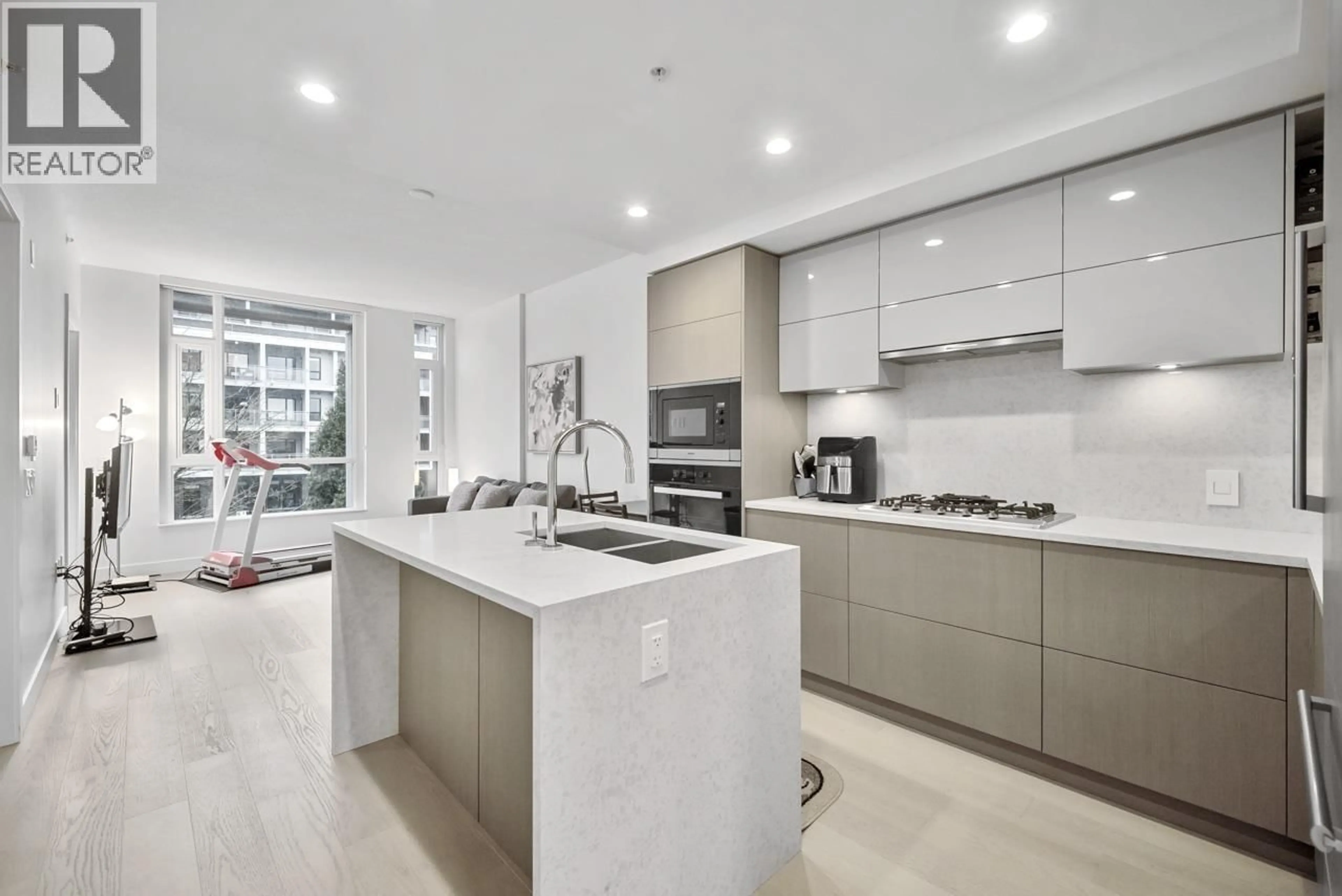 Open concept kitchen, unknown for 303 - 469 KING EDWARD AVENUE, Vancouver British Columbia V5Y2J3