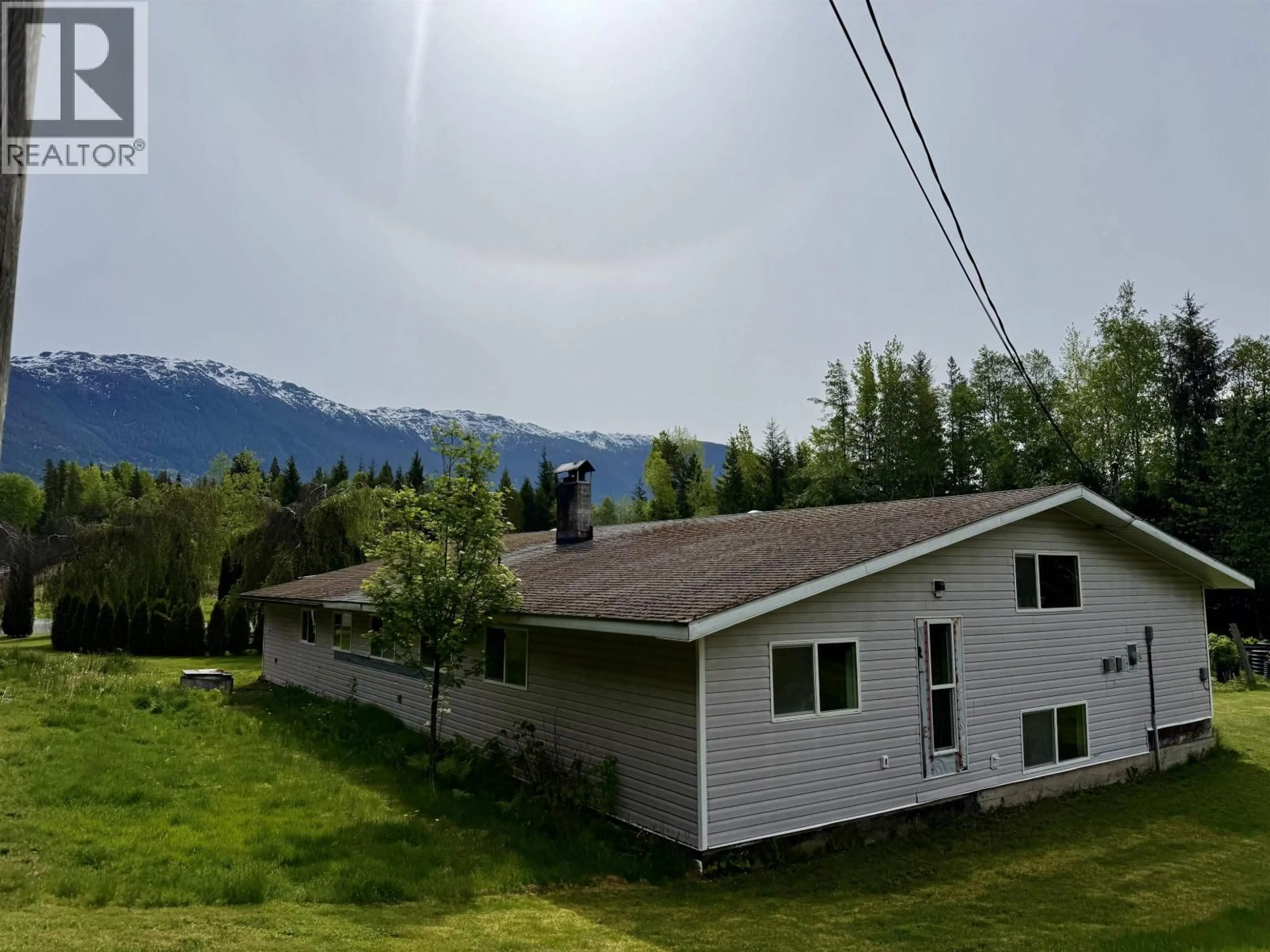 A pic from outside/outdoor area/front of a property/back of a property/a pic from drone, mountain view for 3679 KRUMM AVENUE, Thornhill British Columbia V8G4Y2