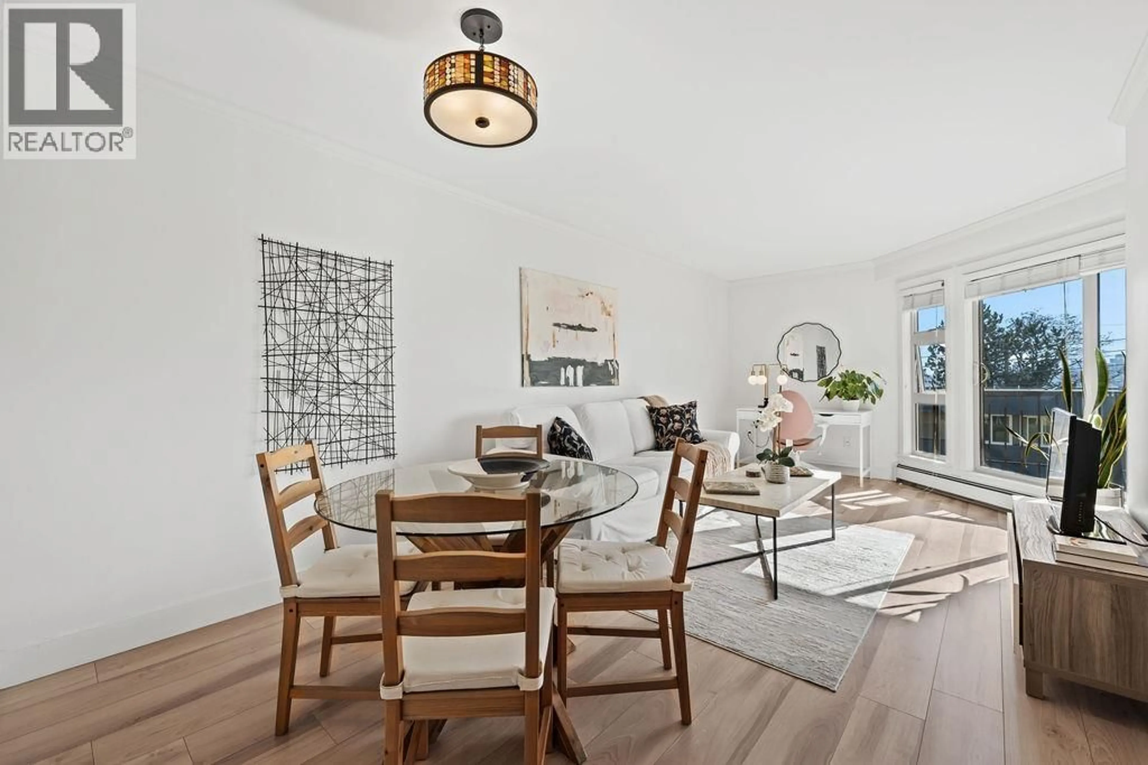Dining room, wood/laminate floor for 235 4TH STREET, North Vancouver British Columbia V7M1H8