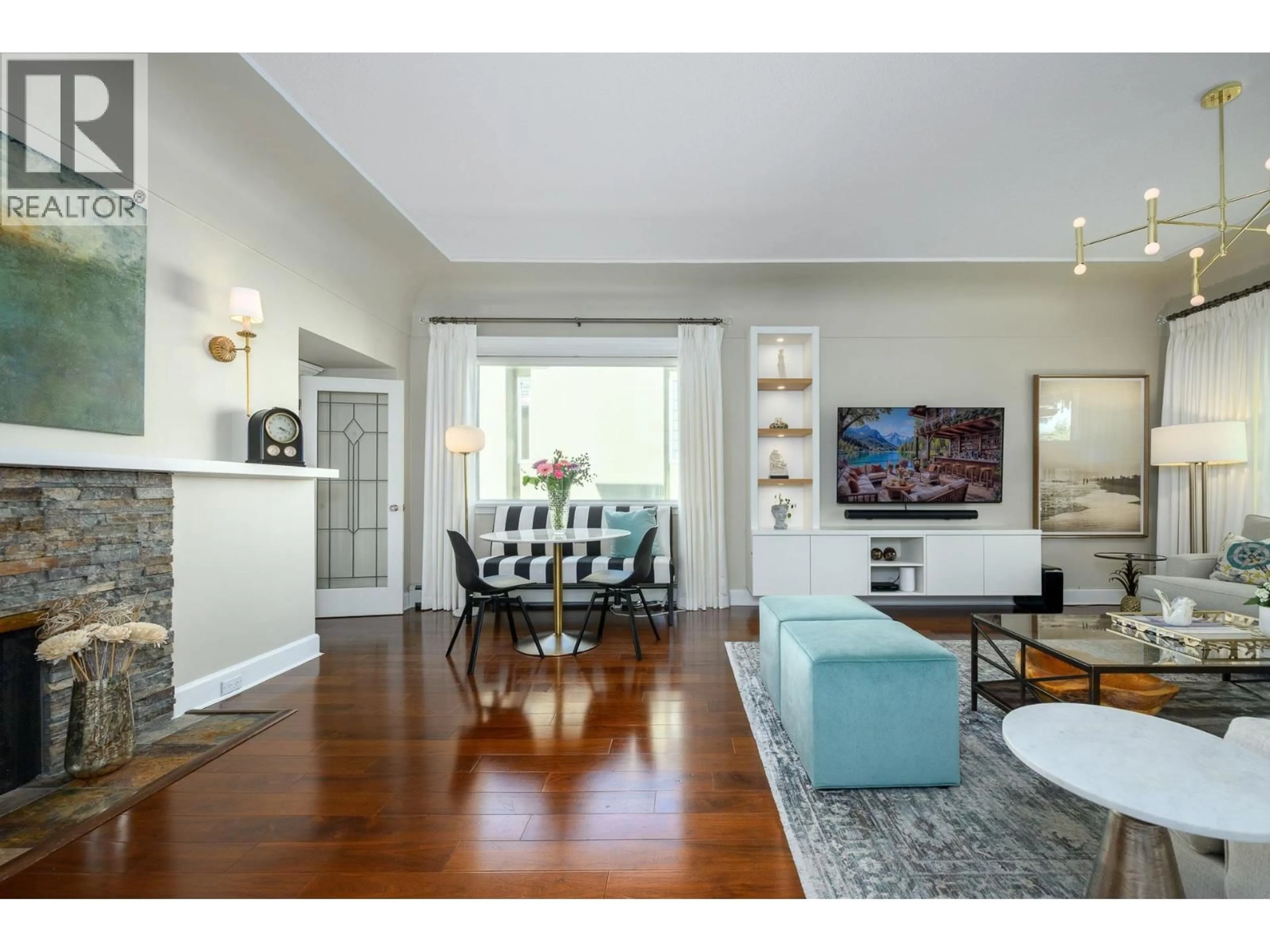 Living room with furniture, wood/laminate floor for 8013 17TH AVENUE, Burnaby British Columbia V3N1M5