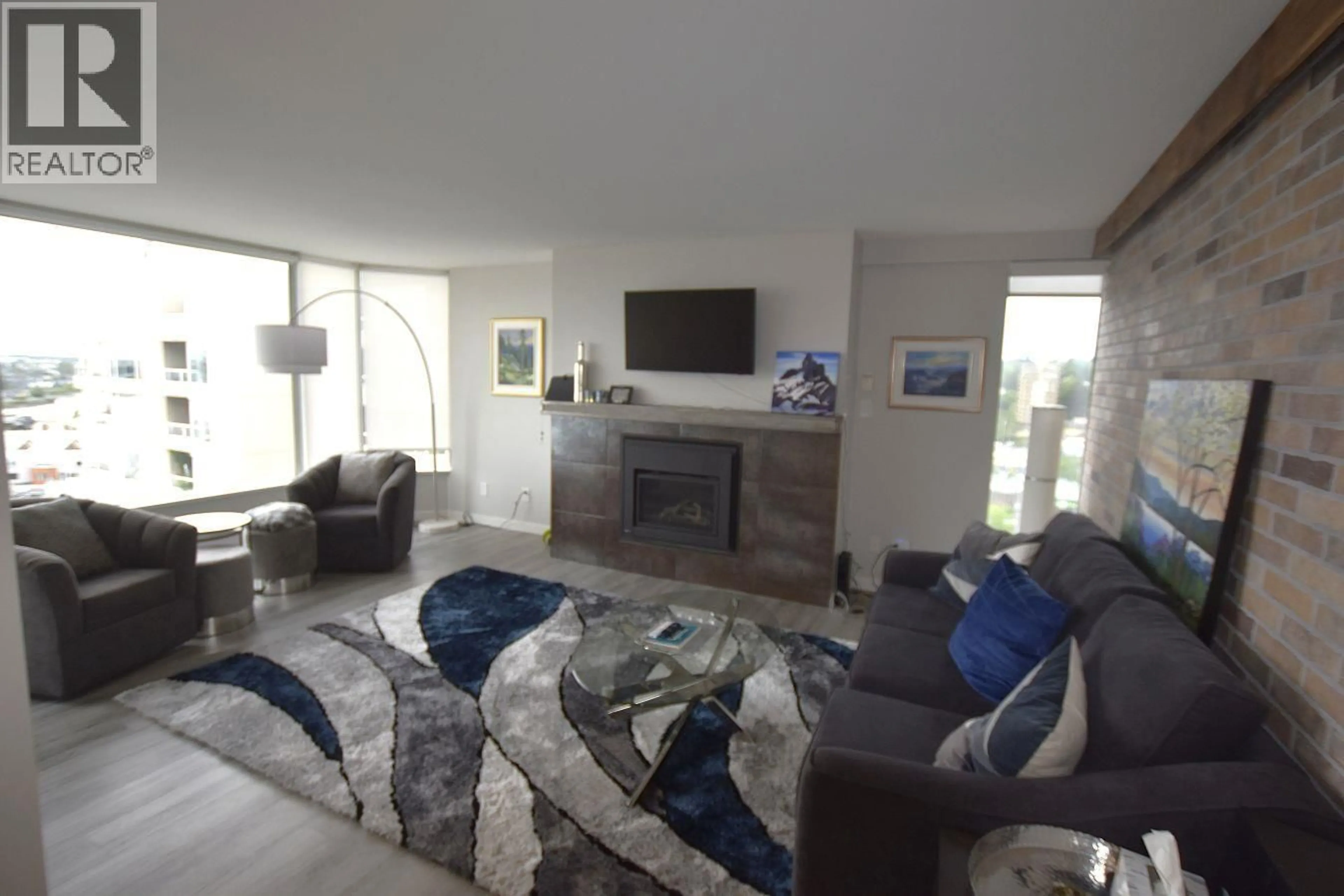 Living room with furniture, unknown for 1606 - 1045 QUAYSIDE DRIVE, New Westminster British Columbia V3M6C9