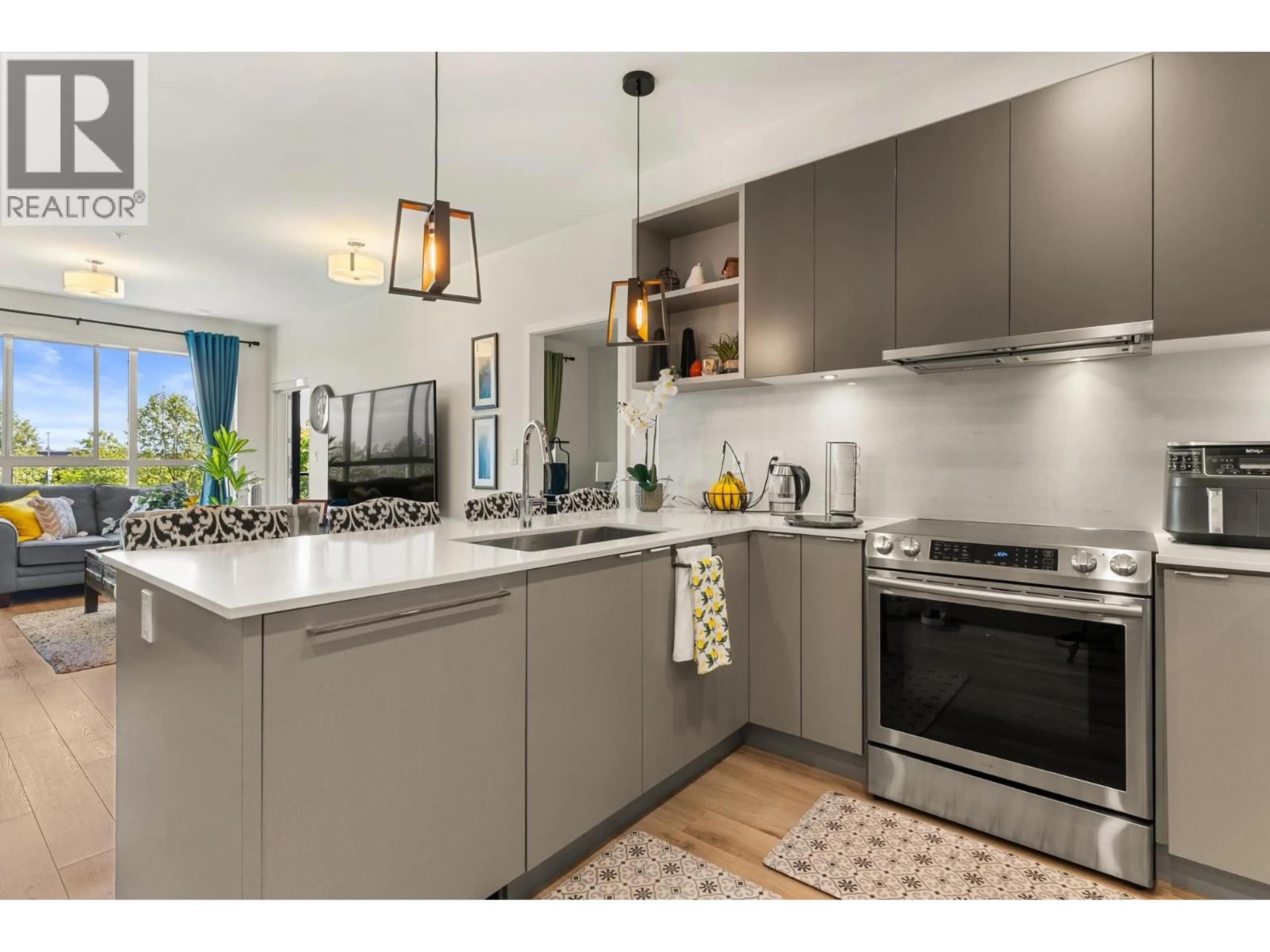 Open concept kitchen, ceramic/tile floor for 204 - 1892 STARLING DRIVE, Delta British Columbia V4M0C7