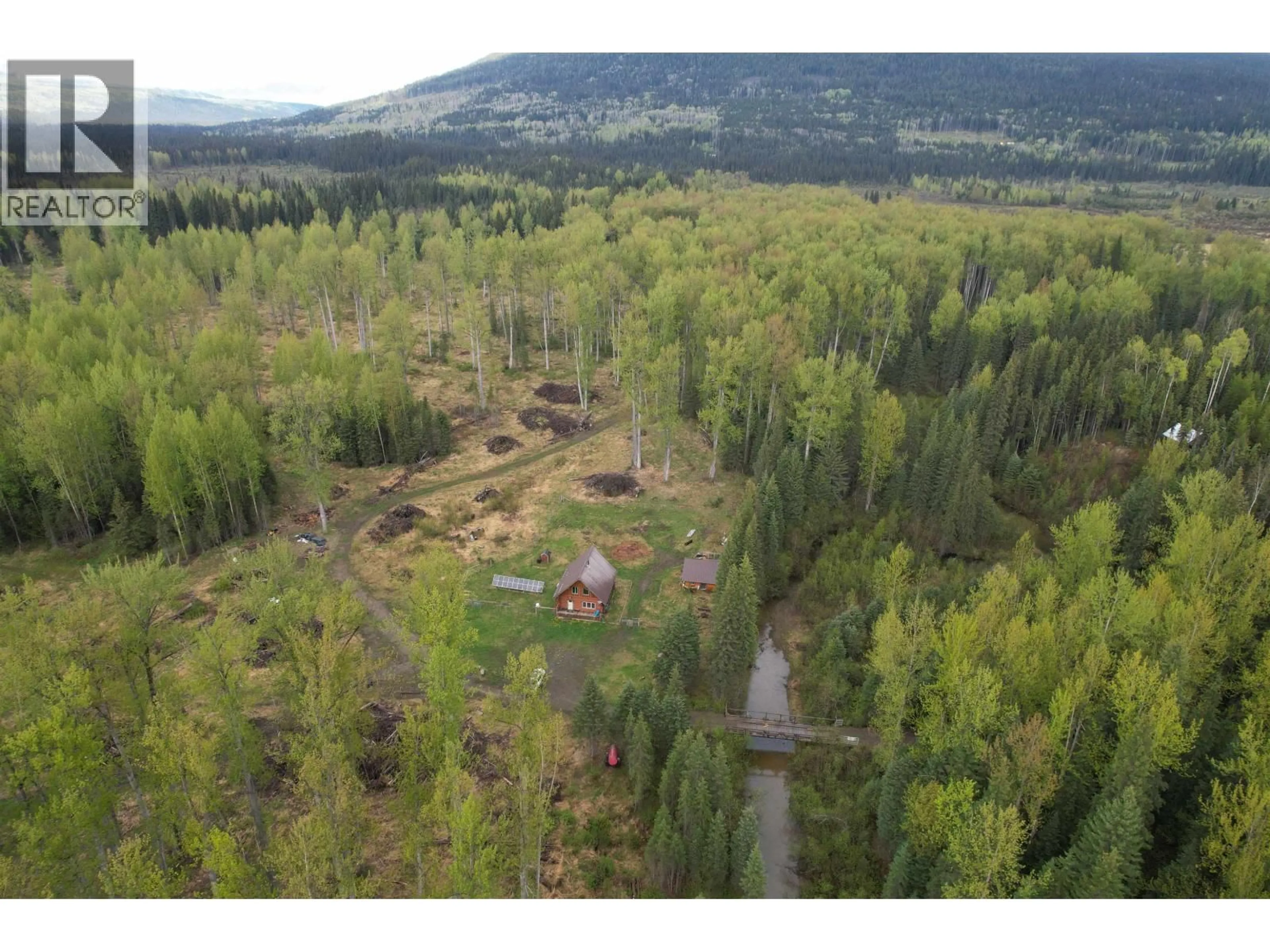 A pic from outside/outdoor area/front of a property/back of a property/a pic from drone, forest/trees view for DL12435 BOWRON LAKE ROAD, Quesnel British Columbia V0K2R0