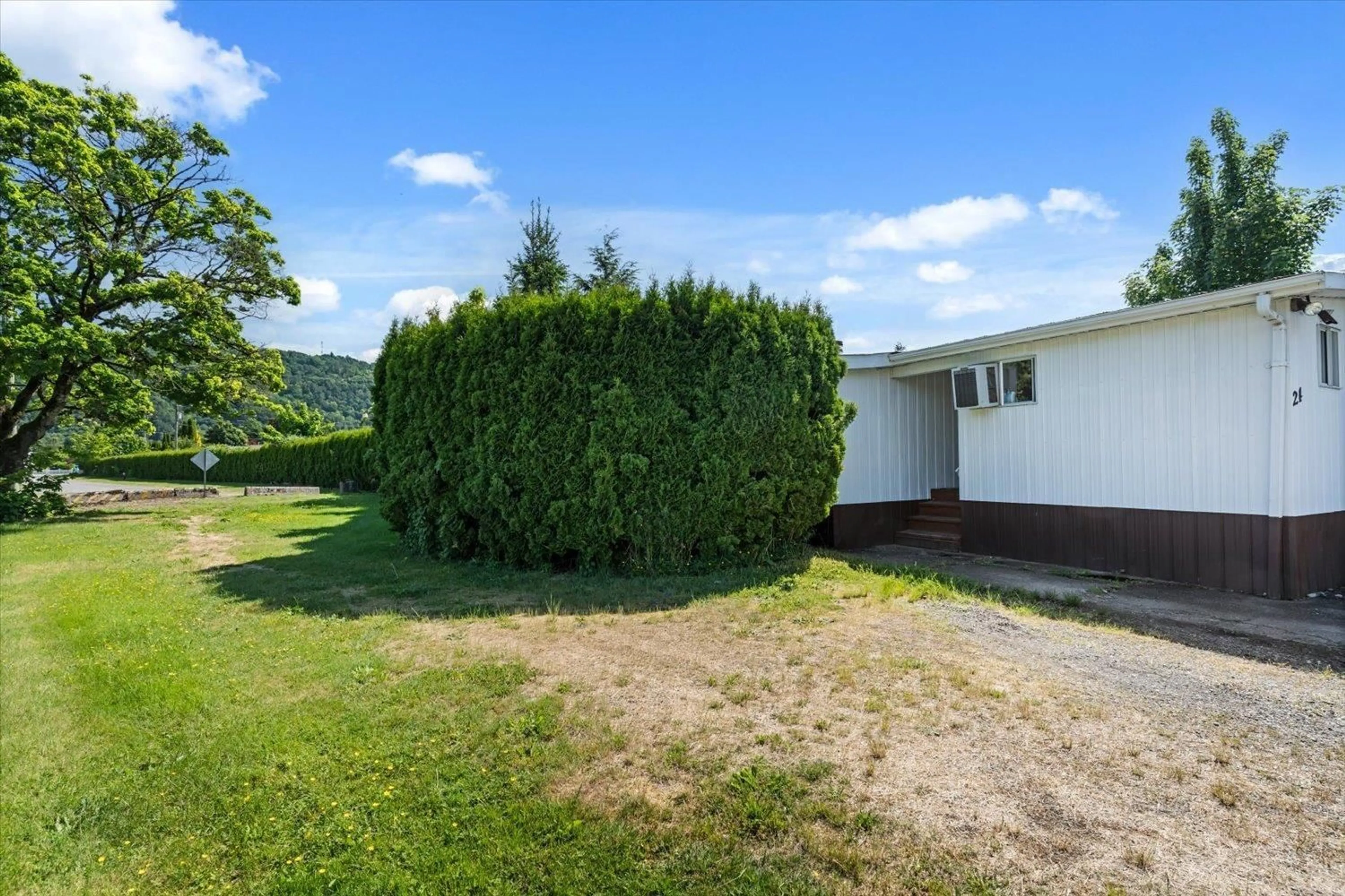 A pic from outside/outdoor area/front of a property/back of a property/a pic from drone, unknown for 24 - 6900 INKMAN ROAD, Chilliwack British Columbia V0M1A1