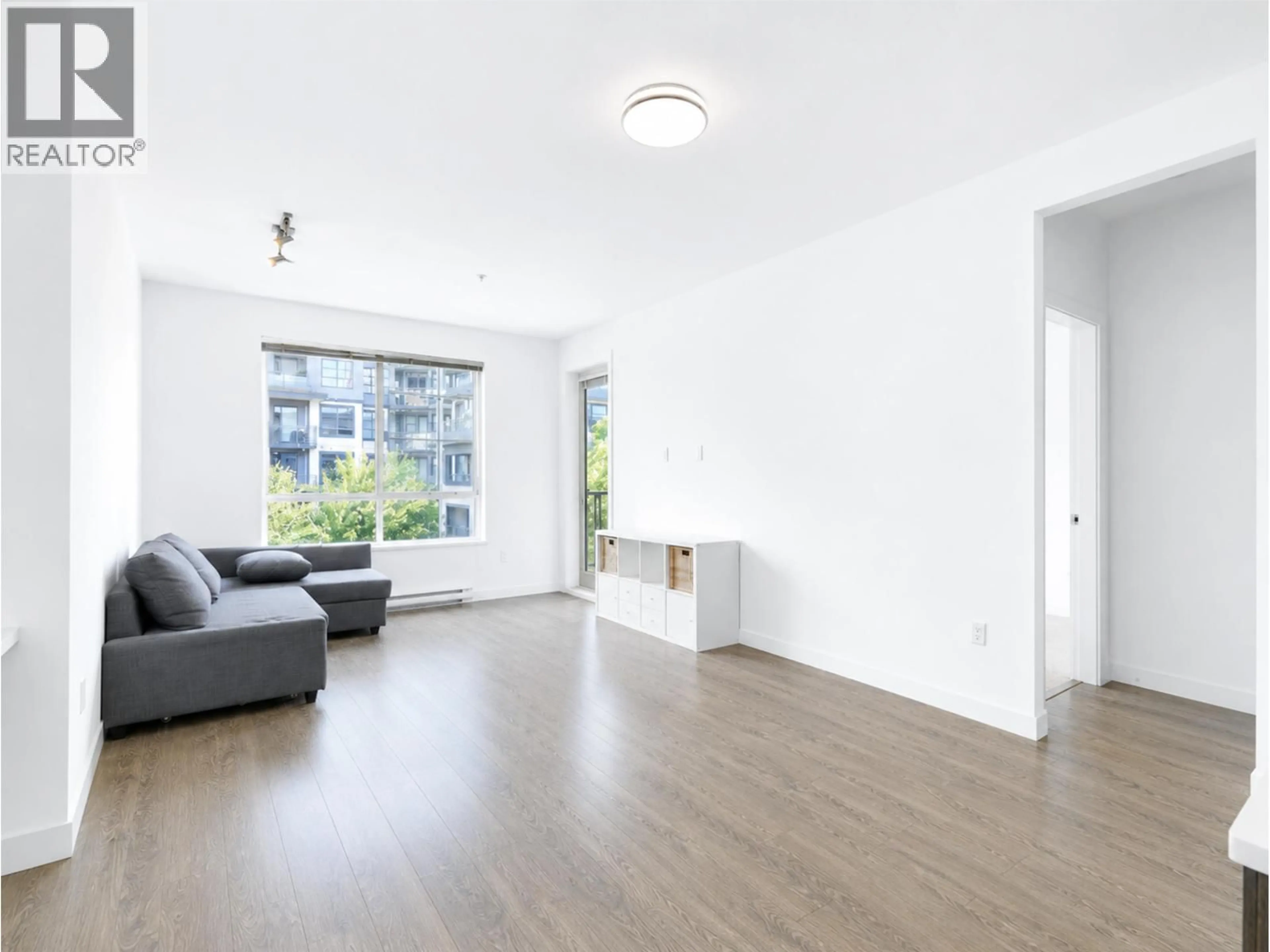 Living room with furniture, unknown for 309 - 608 COMO LAKE AVENUE, Coquitlam British Columbia V3J0B2
