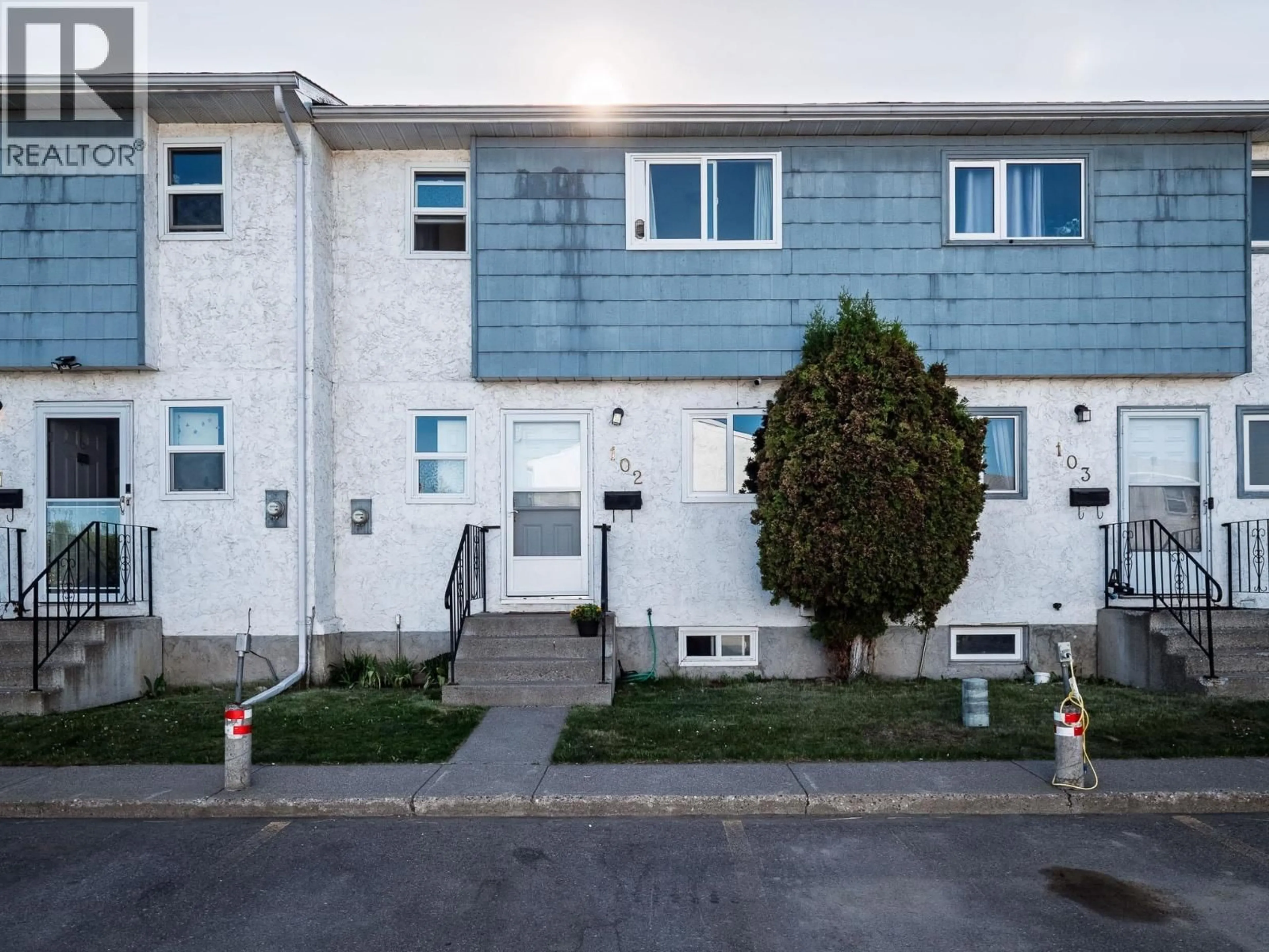 A pic from outside/outdoor area/front of a property/back of a property/a pic from drone, street for 102 - 190 MCINTYRE CRESCENT, Prince George British Columbia V2M6A8