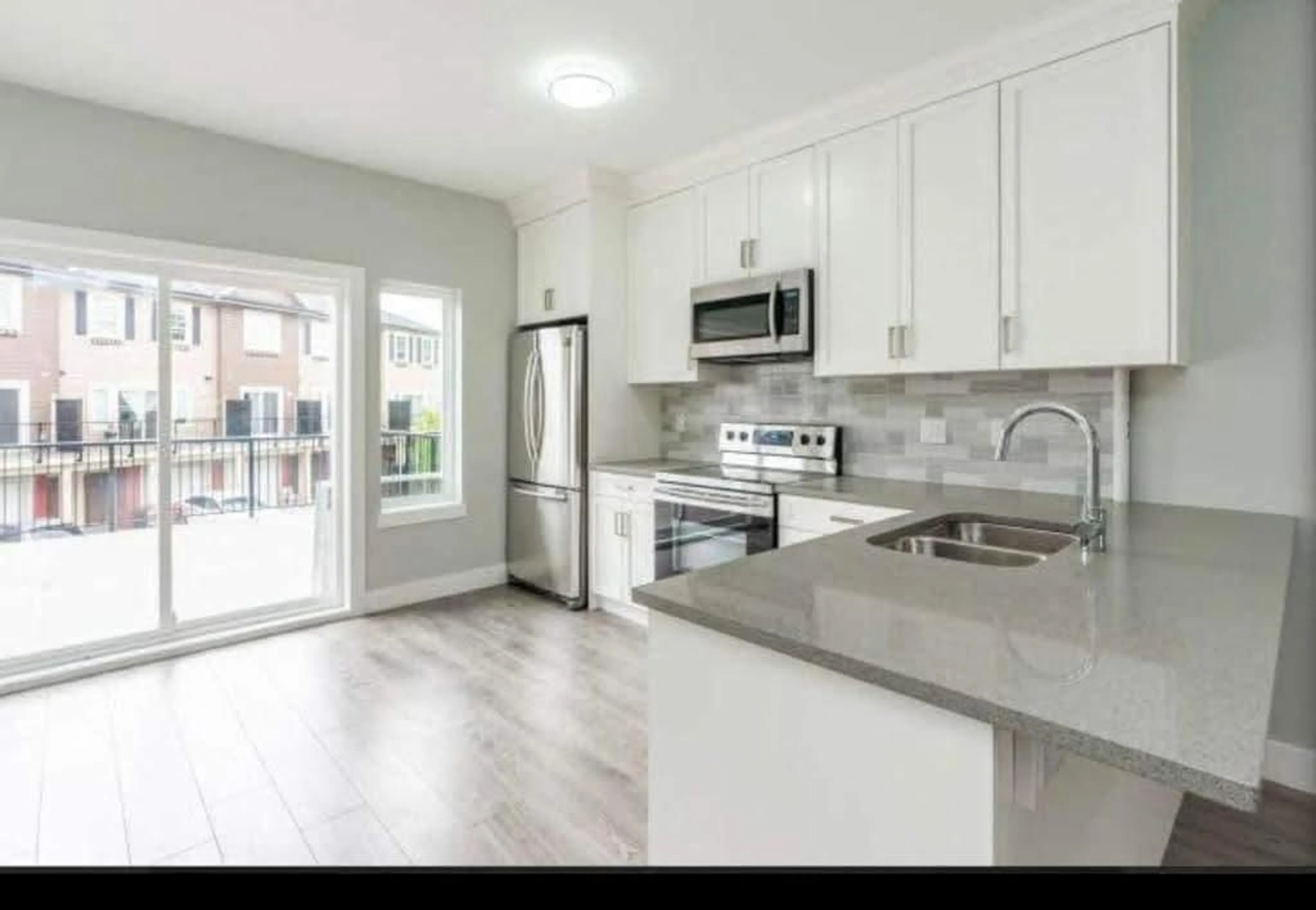 Open concept kitchen, unknown for 14 - 2530 JANZEN STREET, Abbotsford British Columbia V2T2R8