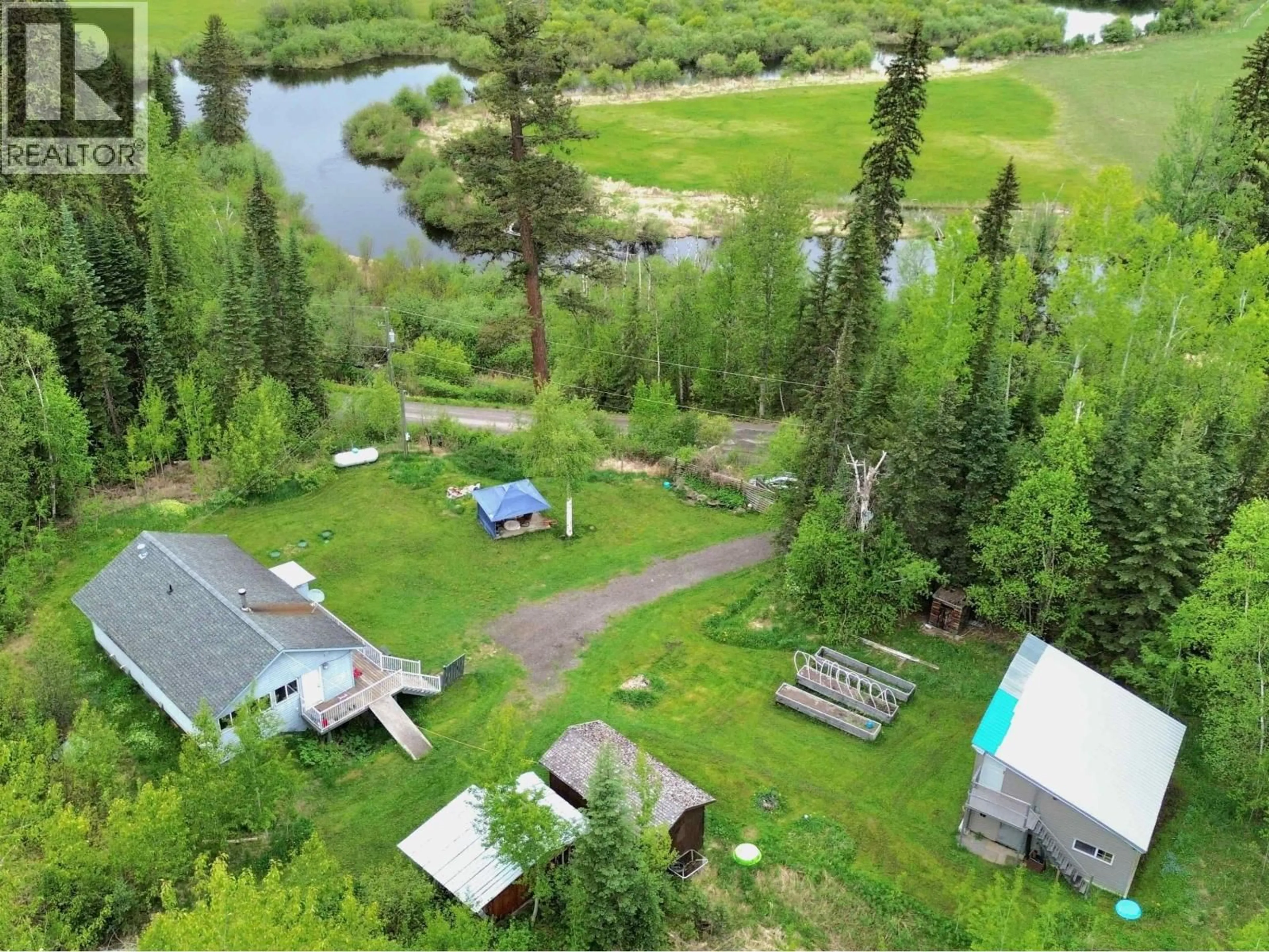 A pic from outside/outdoor area/front of a property/back of a property/a pic from drone, water/lake/river/ocean view for 2261 EAGLE CREEK ROAD, Canim Lake British Columbia V0K1J0