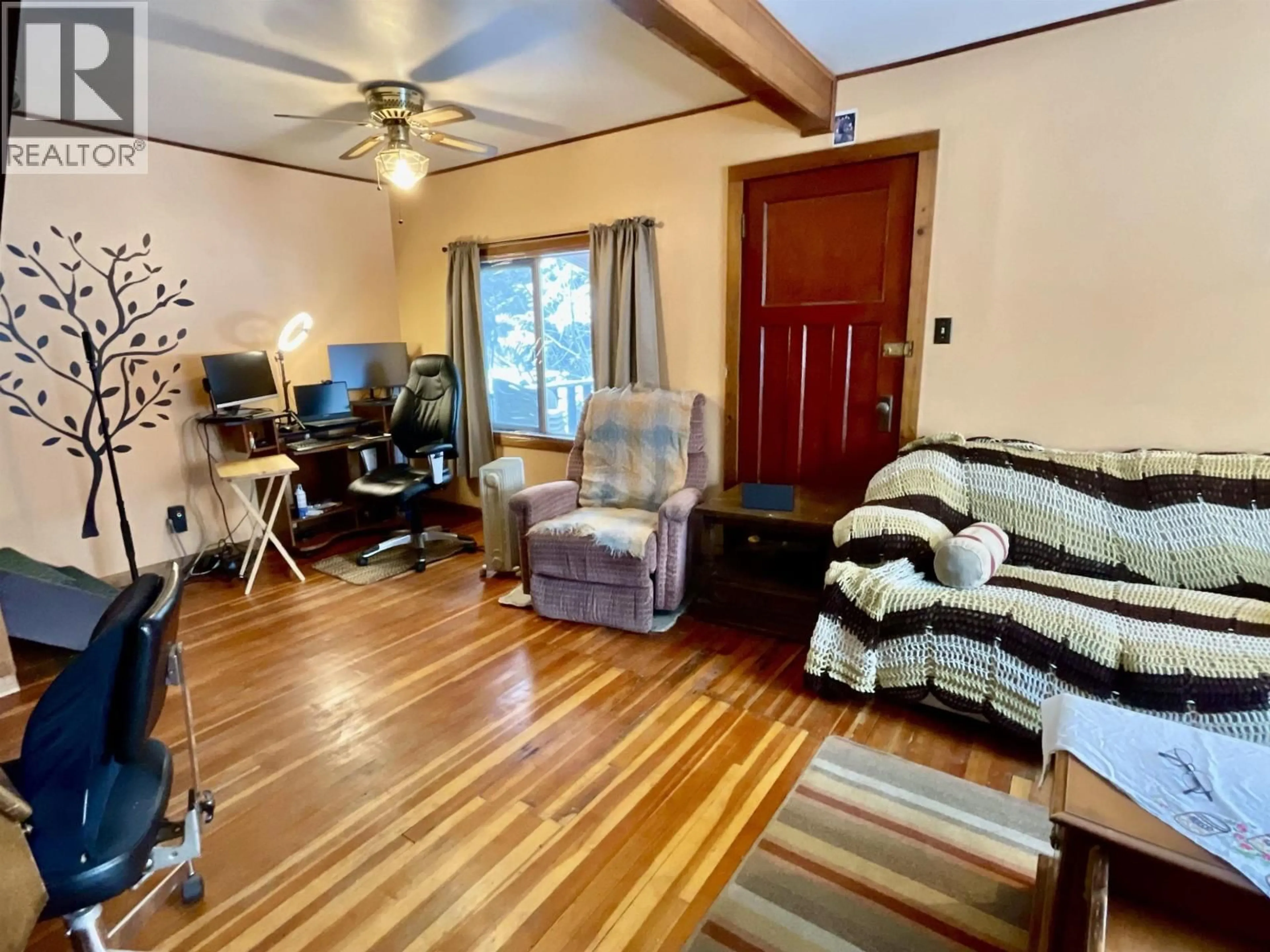 Living room with furniture, wood/laminate floor for 4365 MILDRED AVENUE, Wells British Columbia V0K1B0