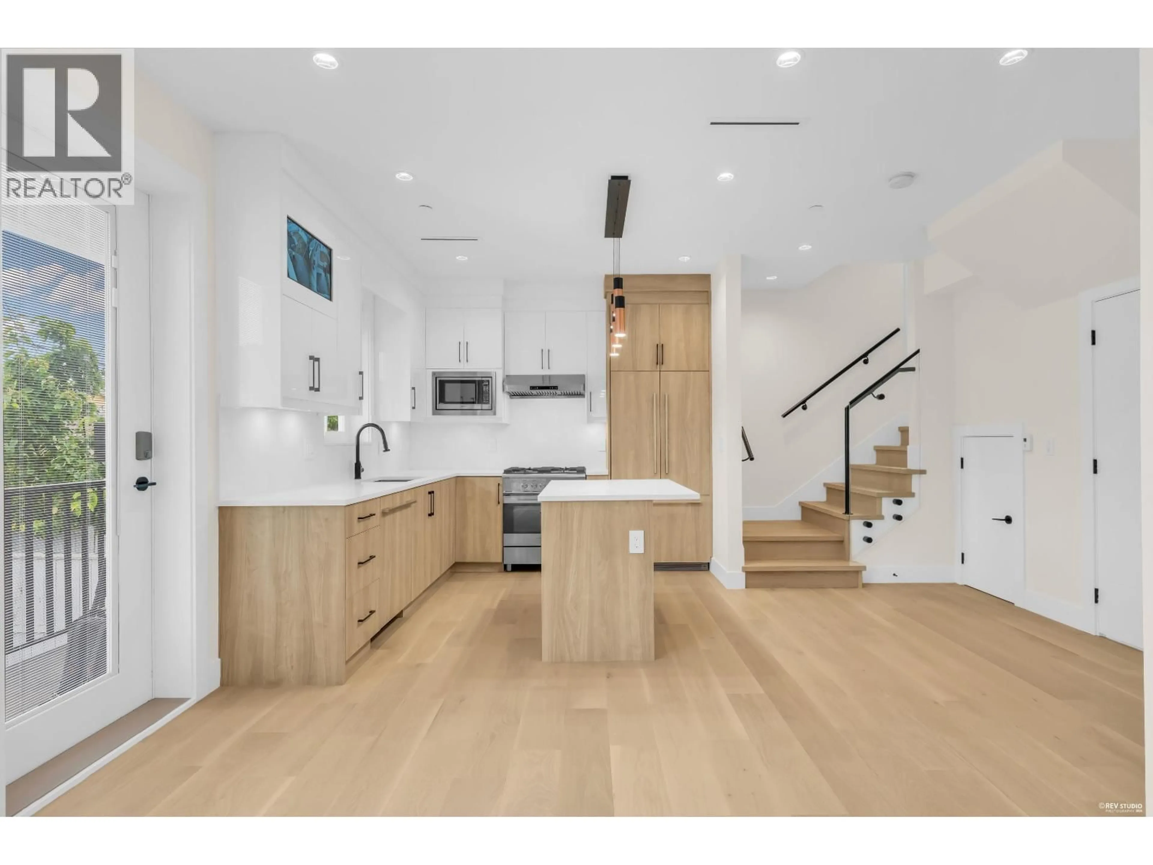 Open concept kitchen, wood/laminate floor for 1620 53RD AVENUE, Vancouver British Columbia V5P3H7