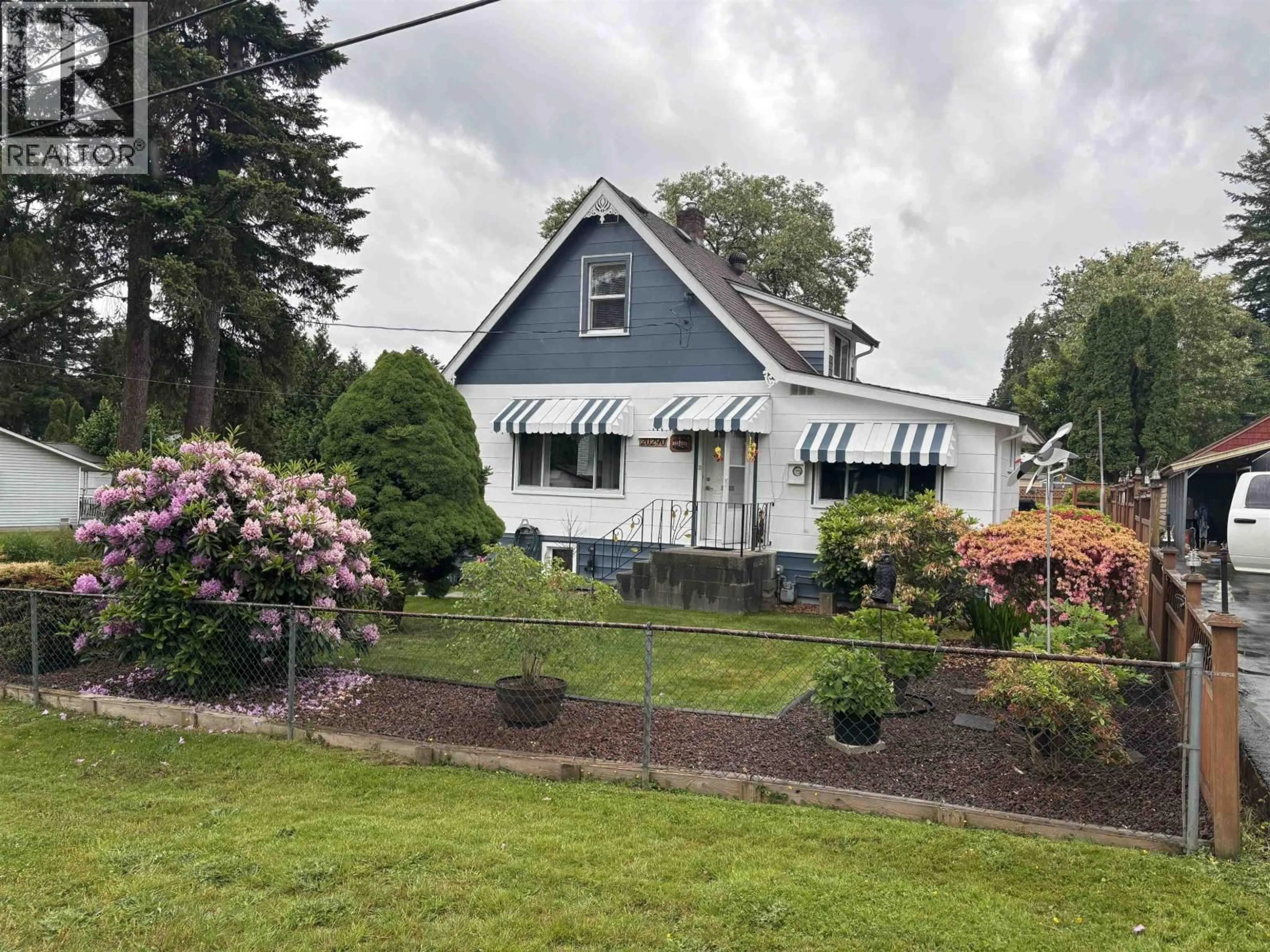 A pic from outside/outdoor area/front of a property/back of a property/a pic from drone, street for 20290 WANSTEAD STREET, Maple Ridge British Columbia V2X1J1