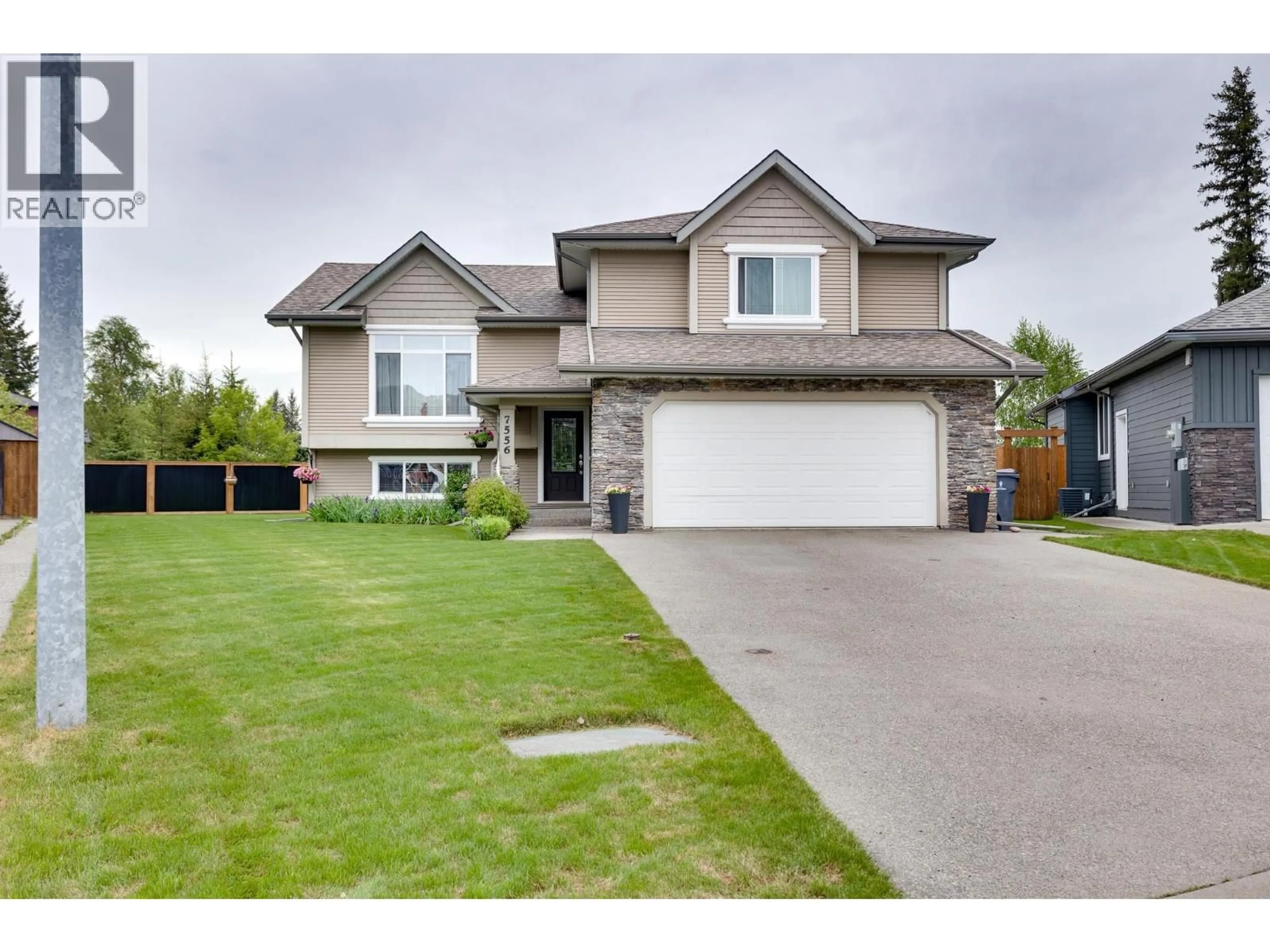 Home with vinyl exterior material, street for 7556 HOUGH PLACE, Prince George British Columbia V2N0A5
