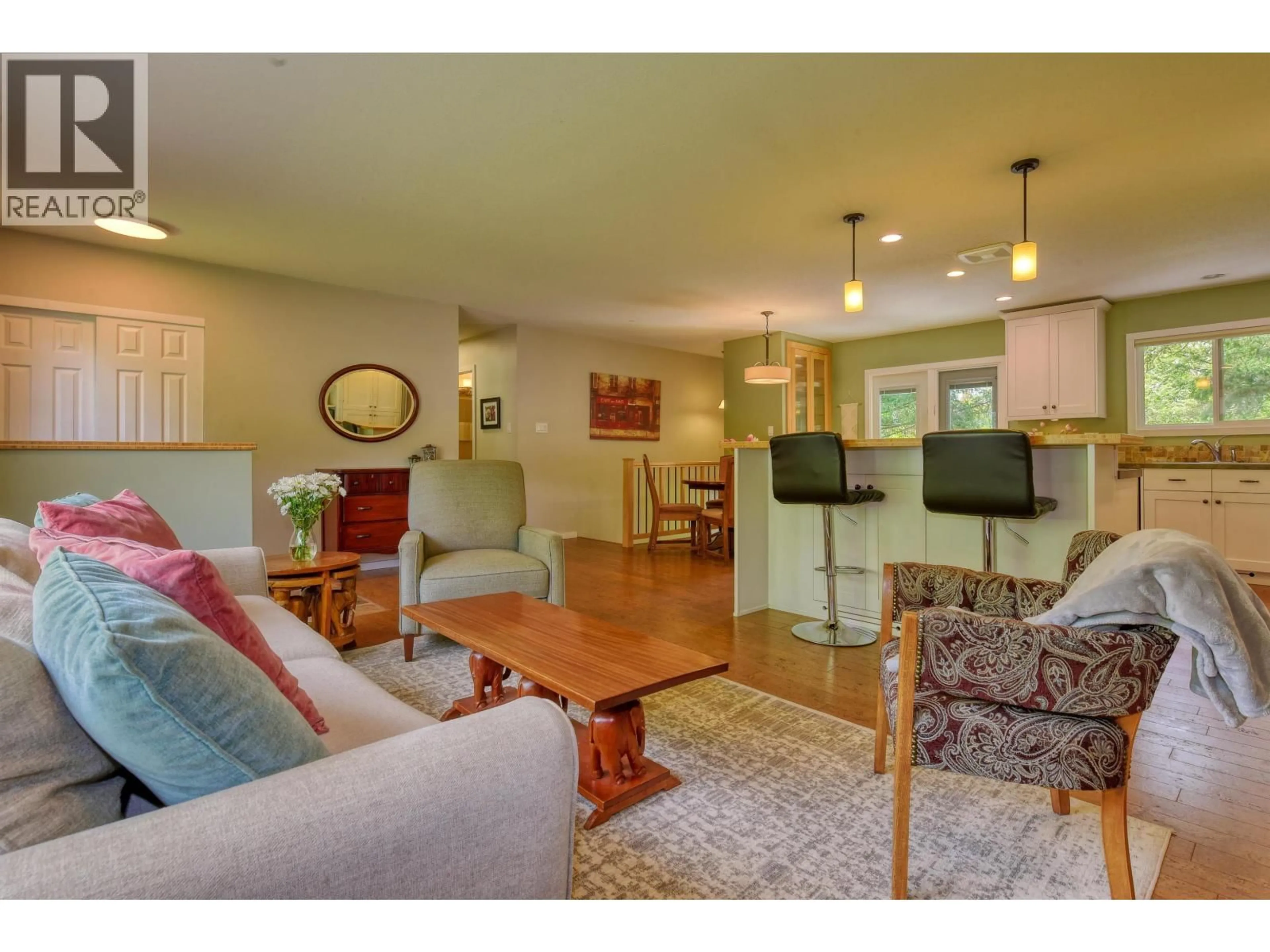 Living room with furniture, wood/laminate floor for 1125 PIGEON AVENUE, Williams Lake British Columbia V2G2C2