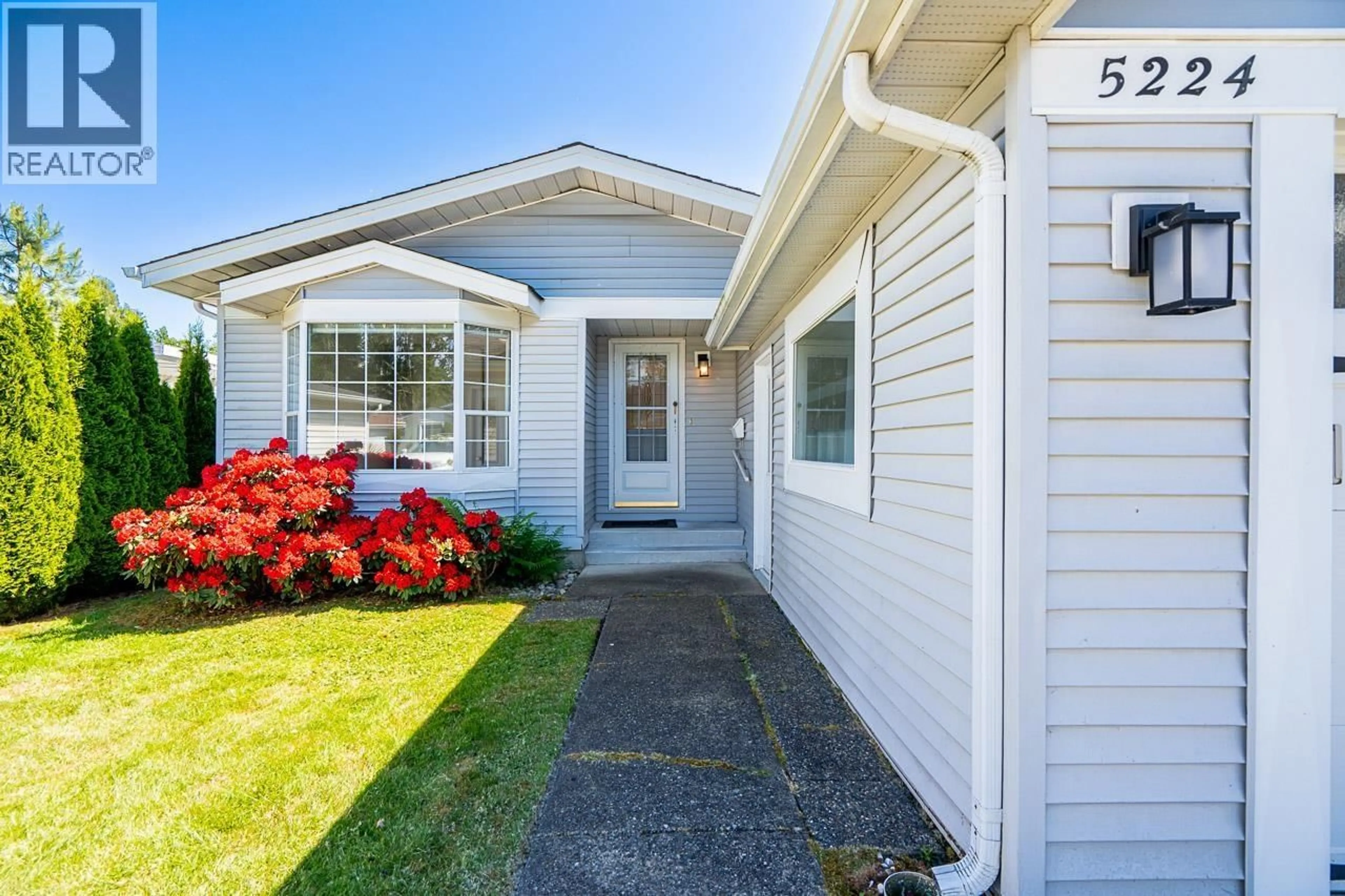 Home with vinyl exterior material, street for 5224 REGATTA WAY, Delta British Columbia V4K4N5