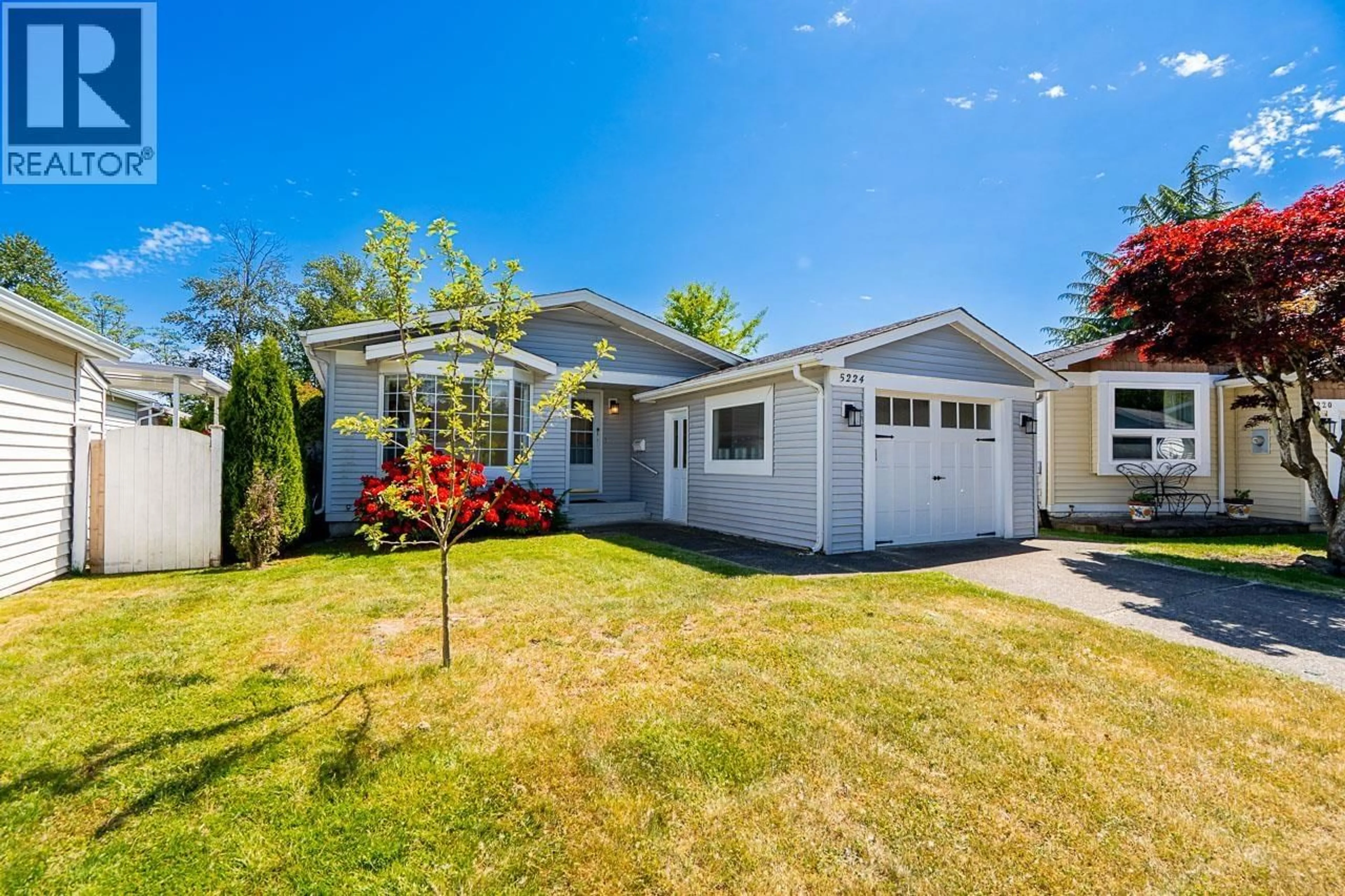 Home with vinyl exterior material, street for 5224 REGATTA WAY, Delta British Columbia V4K4N5